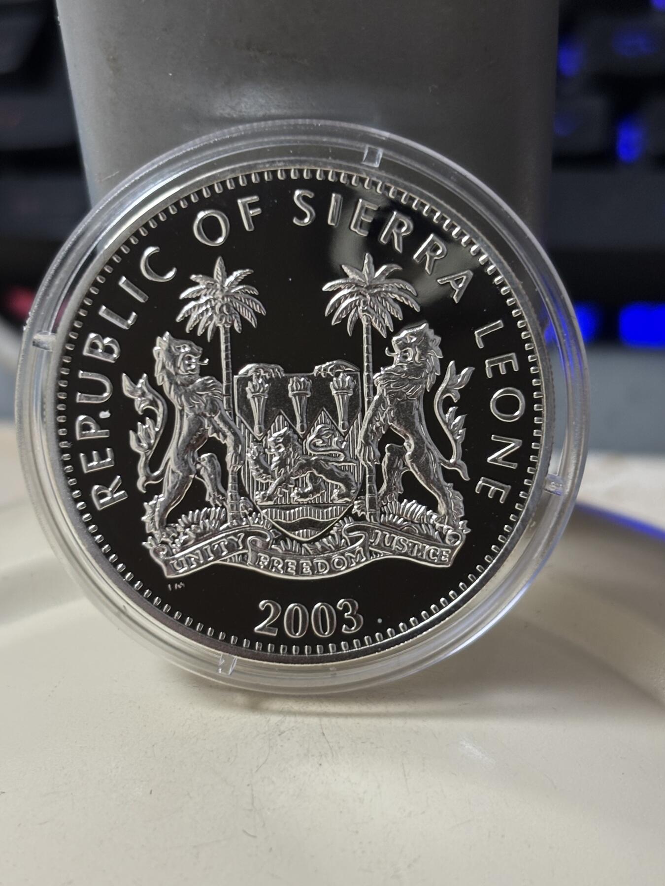 第185期拍卖 塞拉利昂2003年铁臂阿童木精制彩色全套3枚银币，925银，28克*3.，有少许氧化