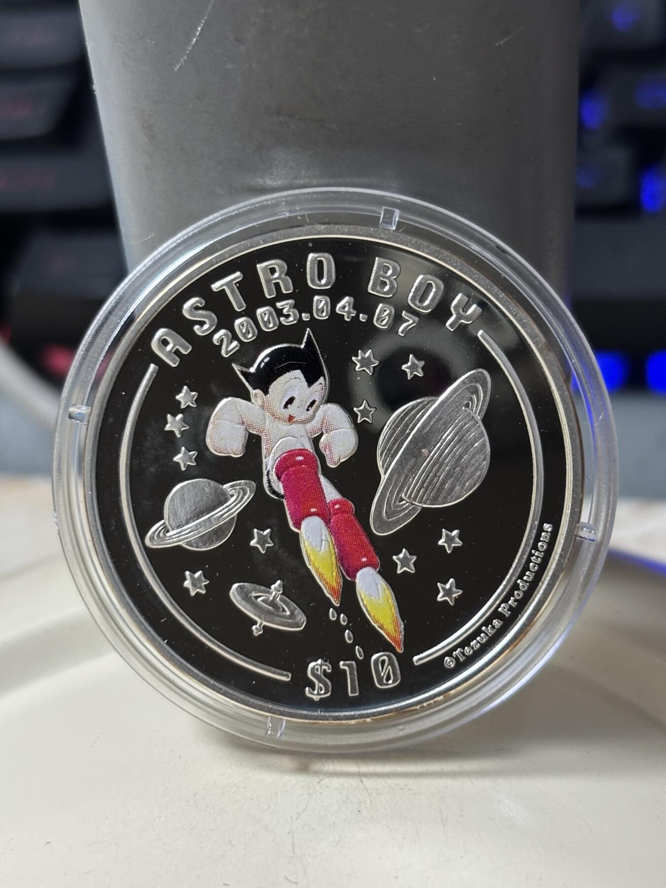 第185期拍卖 塞拉利昂2003年铁臂阿童木精制彩色全套3枚银币，925银，28克*3.，有少许氧化