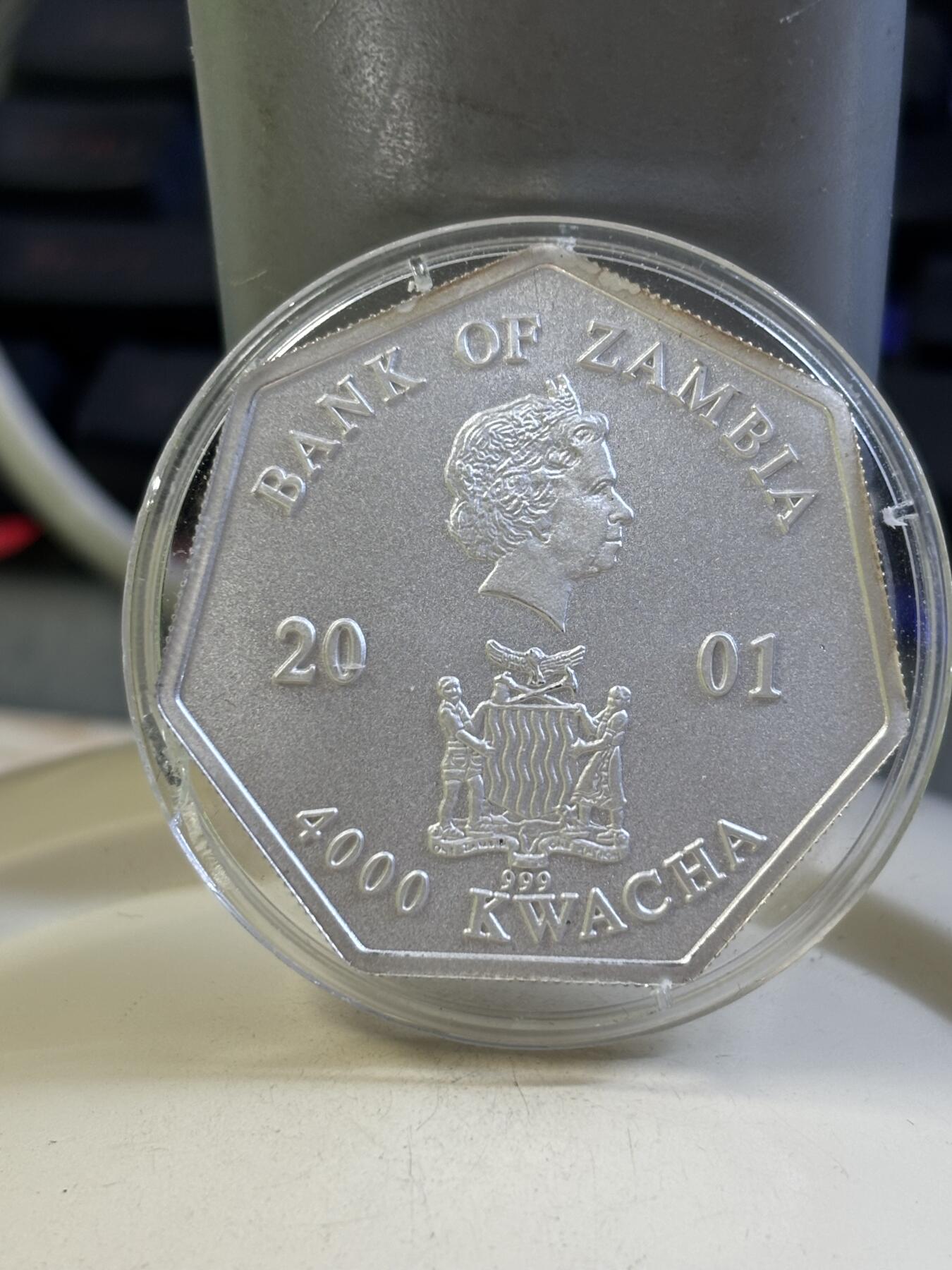 第184期拍卖 赞比亚2001年千禧年系列日历七边形磨砂纪念银币，999银，23克