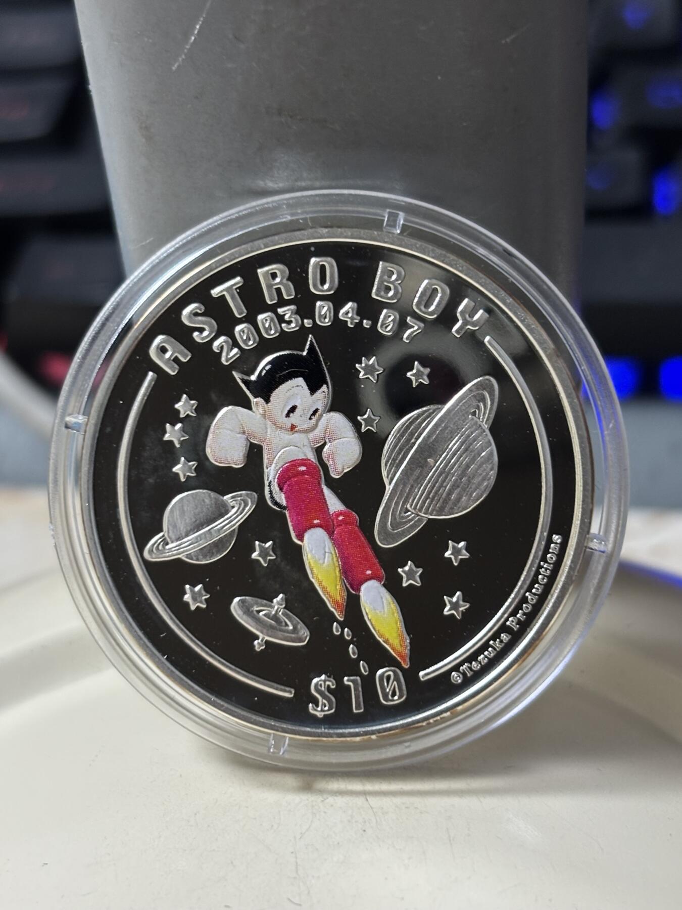 第185期拍卖 塞拉利昂2003年铁臂阿童木精制彩色全套3枚银币，925银，28克*3.，有少许氧化