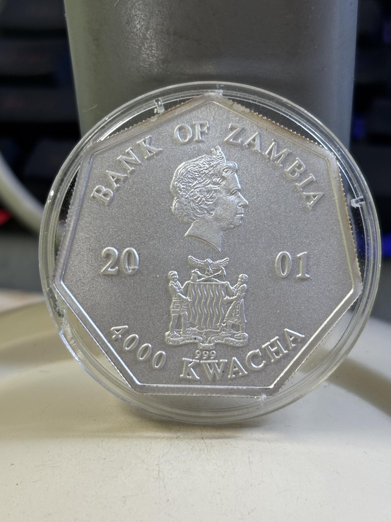 第184期拍卖 赞比亚2001年千禧年系列日历七边形磨砂纪念银币，999银，23克