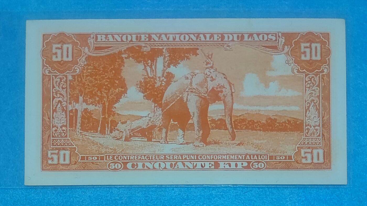 12月5日 🌏全球币章 稀品：1957年，老挝（北京版），50基普，659896号，旧品相（有4个针孔）