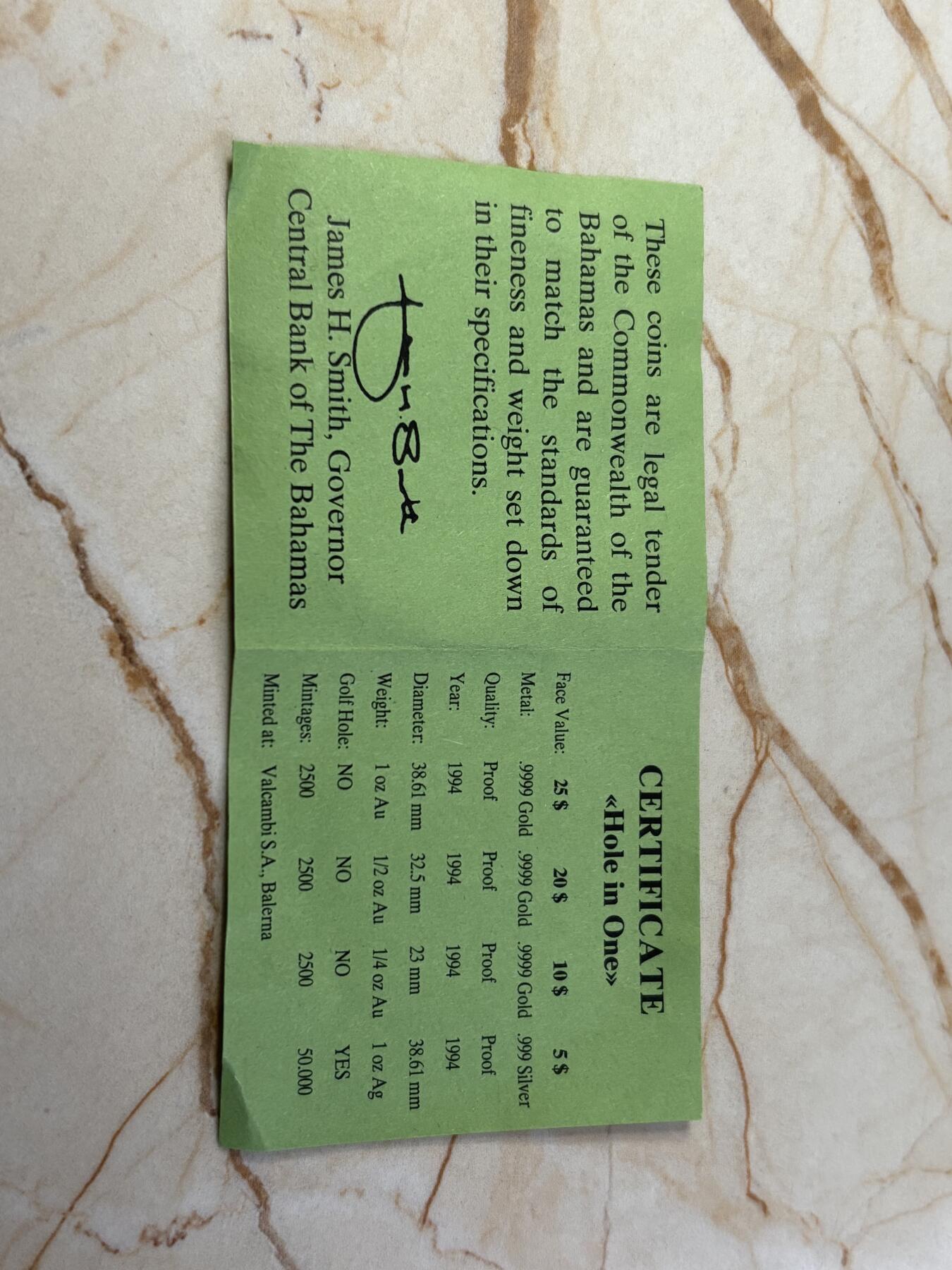 第184期拍卖 获奖币巴哈马1994年一杆进洞镂空精制纪念银币带证书，获得克劳斯1996年度最佳创意币大奖，999银，1盎司