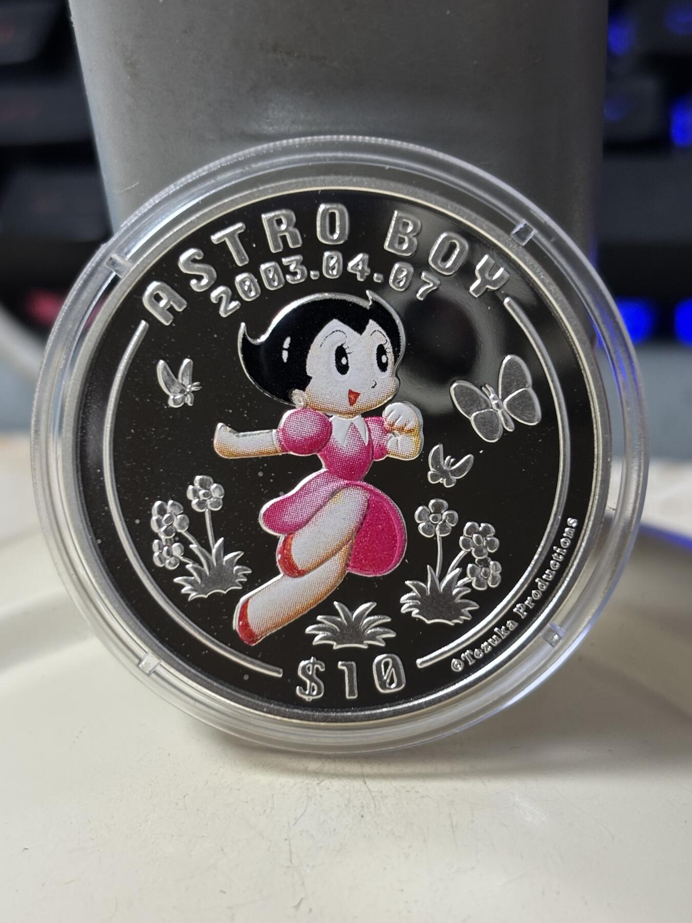 第185期拍卖 塞拉利昂2003年铁臂阿童木精制彩色全套3枚银币，925银，28克*3.，有少许氧化