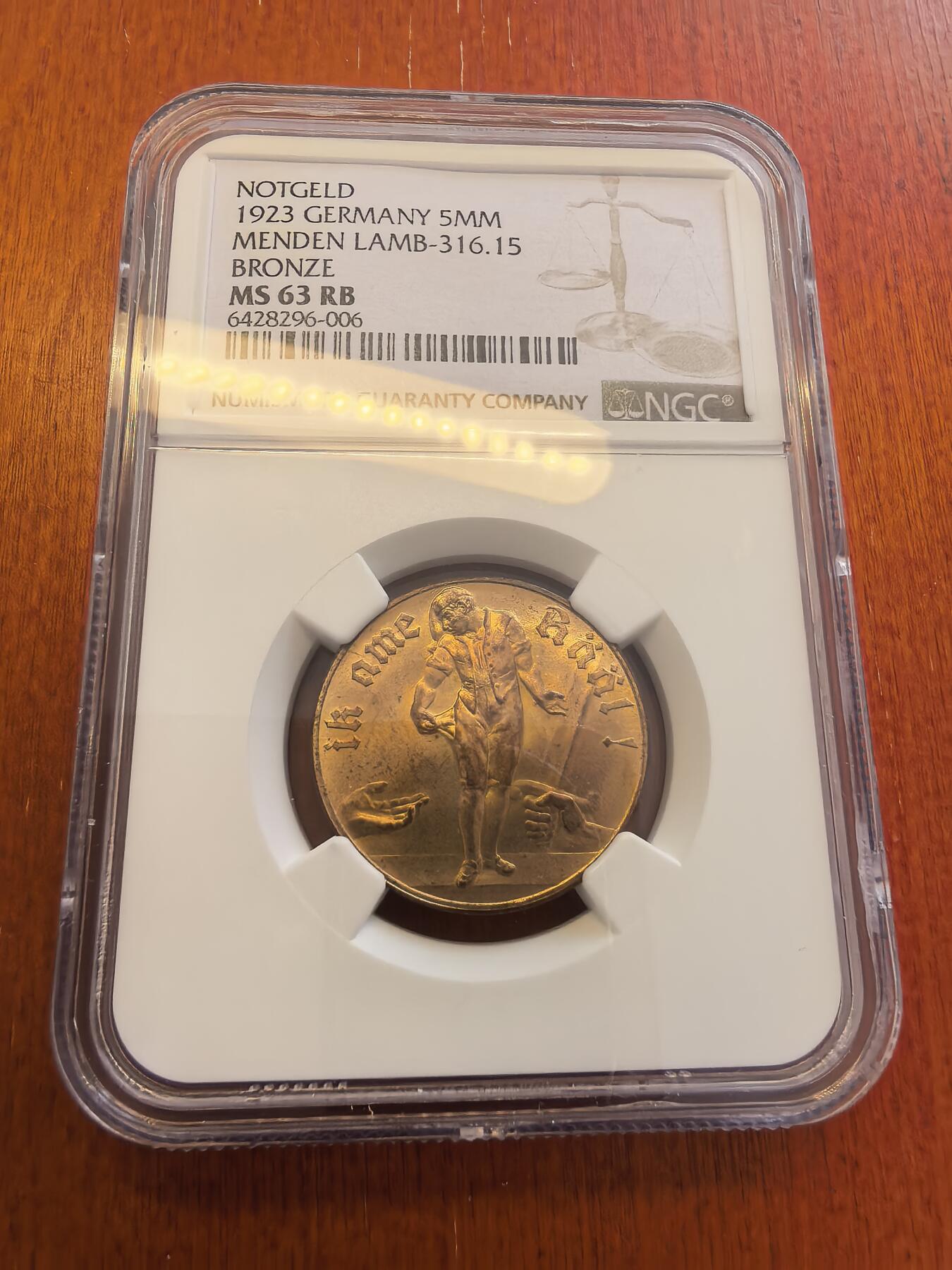 长老汇蛇年精选第八十场拍卖 1923 德紧门肯5百万马克铜币，NGC MS63RB