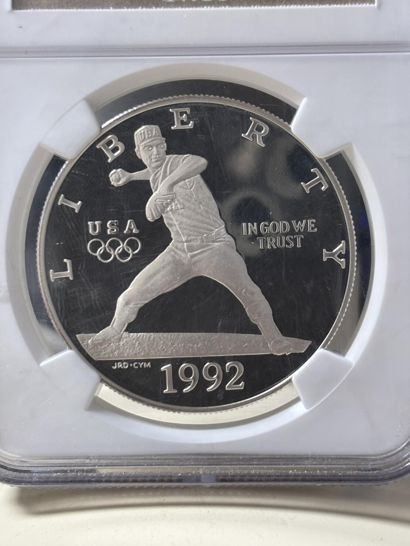 第185期拍卖 美国1992年巴塞罗那奥运棒球精制纪念银币NGC-PF69，900银，26.72克