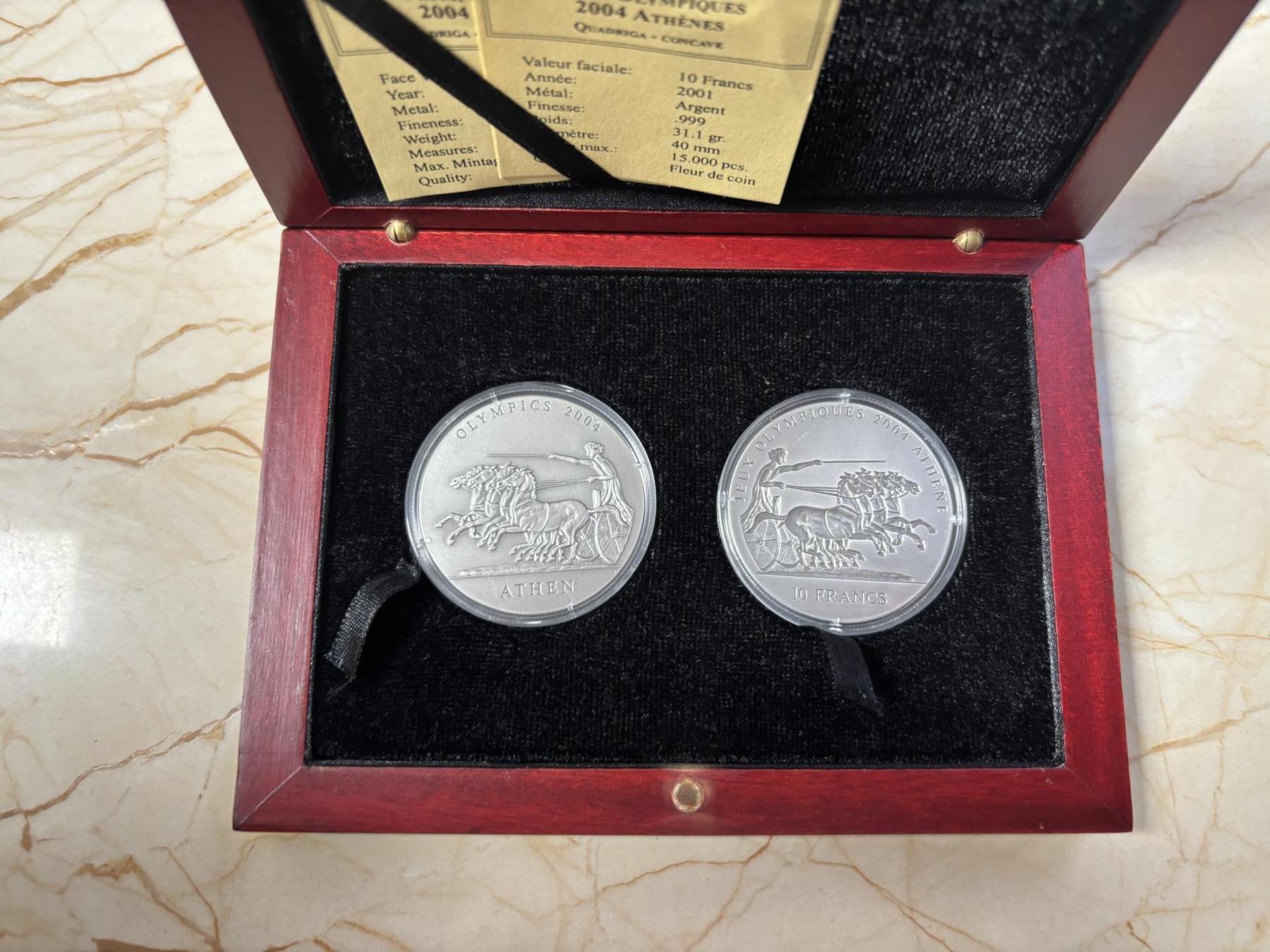 第185期拍卖 刚果加纳2001年古代太阳神马车凹凸银币两枚，999银，31.1克*2，发行15000枚