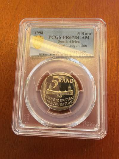 长老汇蛇年精选第八十场拍卖 - 1994南非总统就职5朗德精制铜镍币，PCGS PR67DCAM，HA2011年同分成交价8000多元