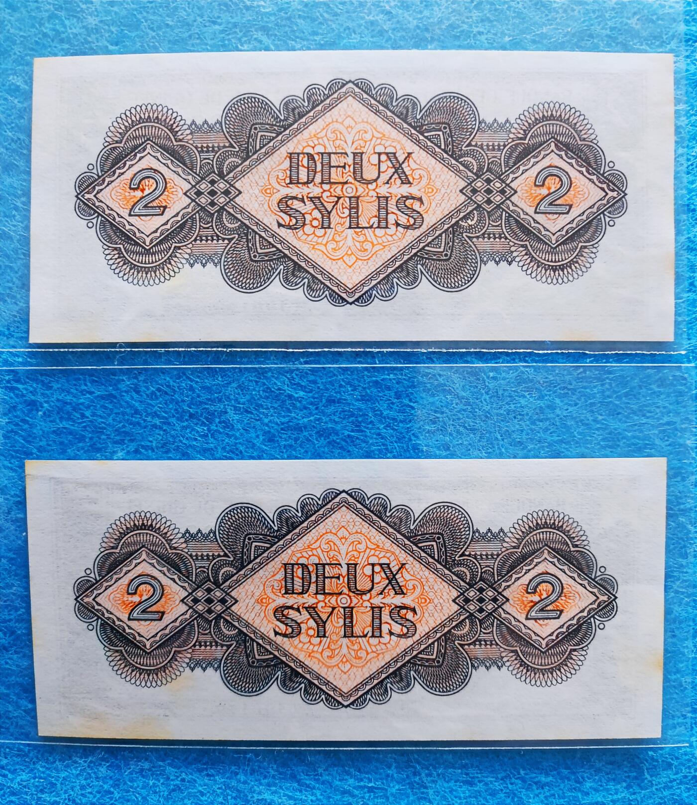 12月6日 🌏全球币章 稀品：1981年，几内亚（北京版），2西里，032618+032619号，au品相