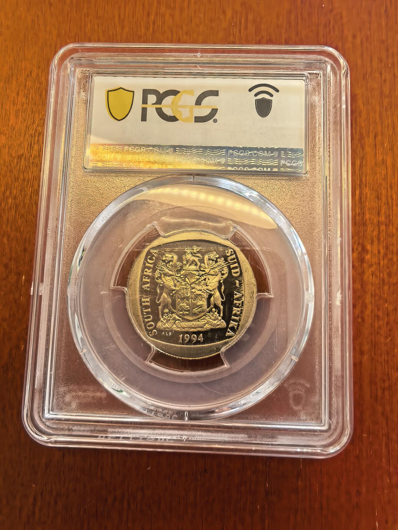 长老汇蛇年精选第八十场拍卖 1994南非总统就职5朗德精制铜镍币，PCGS PR67DCAM，HA2011年同分成交价8000多元