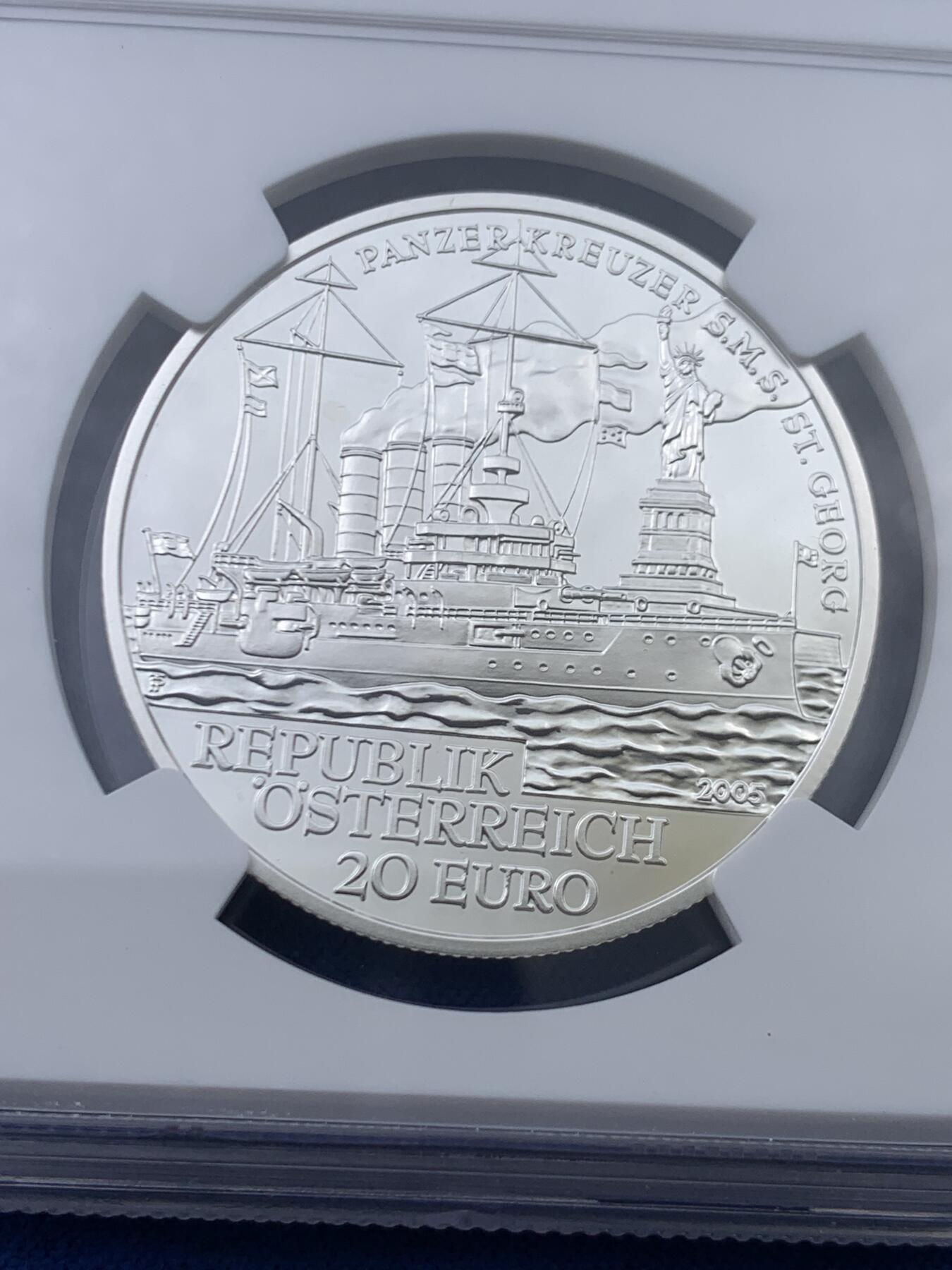 《竞宝斋》第445场 周日，周一，2场连拍 （全场包邮） 获奖币 NGC PF69UC 2005年奥地利圣乔治战舰20欧精制纪念银币（18克重，900银，盒证齐全，发行量5万枚）荣膺克劳斯世界硬币大赛2007年最佳银币，币面浮雕栩栩如生，波涛滚滚的海浪和远处若影若线的自由女神雕像见证了百年哈布斯堡王朝海军的昔日辉煌！（个人认为奥地利获奖币中美不胜收的一枚）