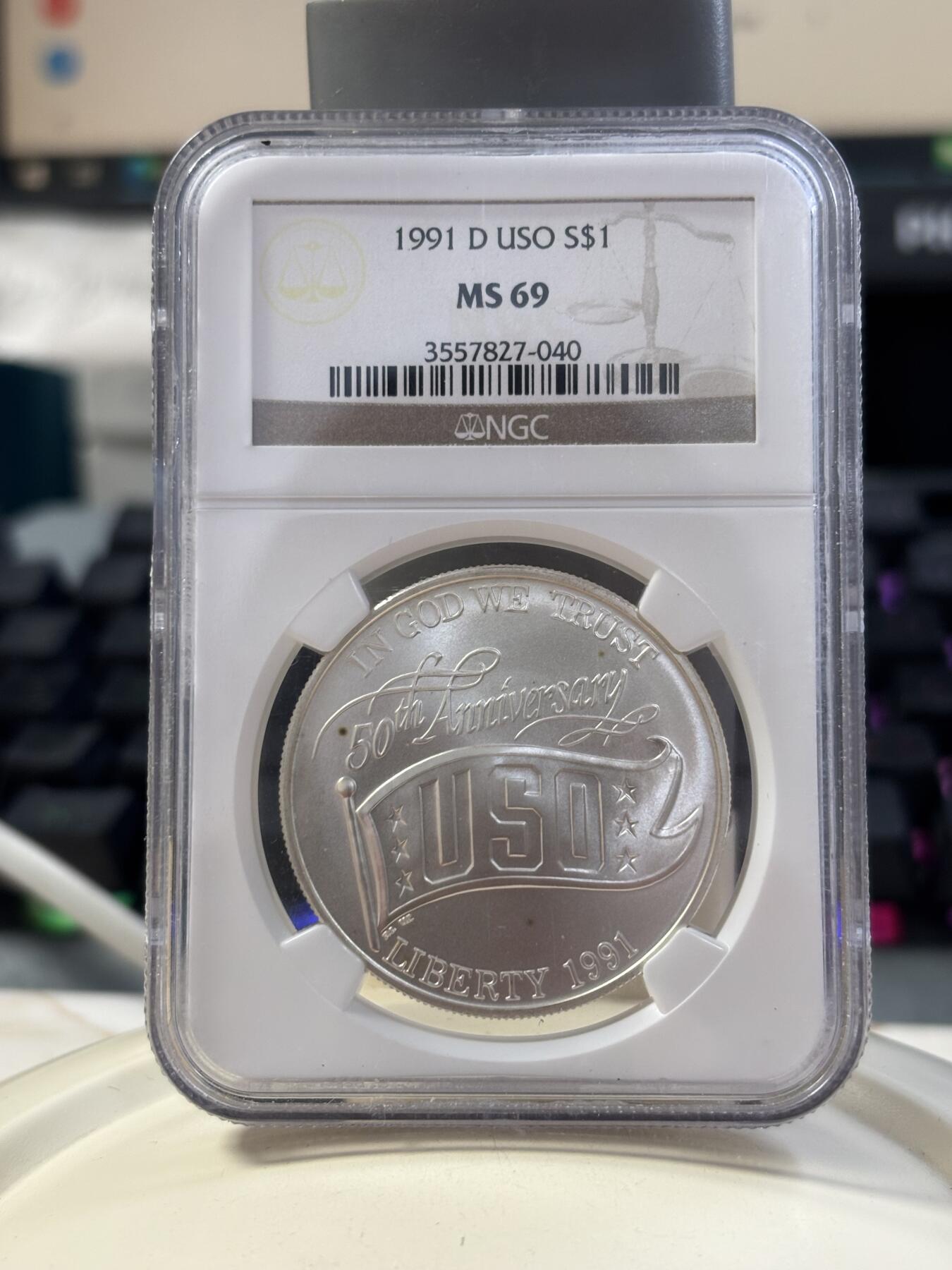 第185期拍卖 美国1991年USO(劳军组织)成立50年银币NGC-MS69，900银，26.72克