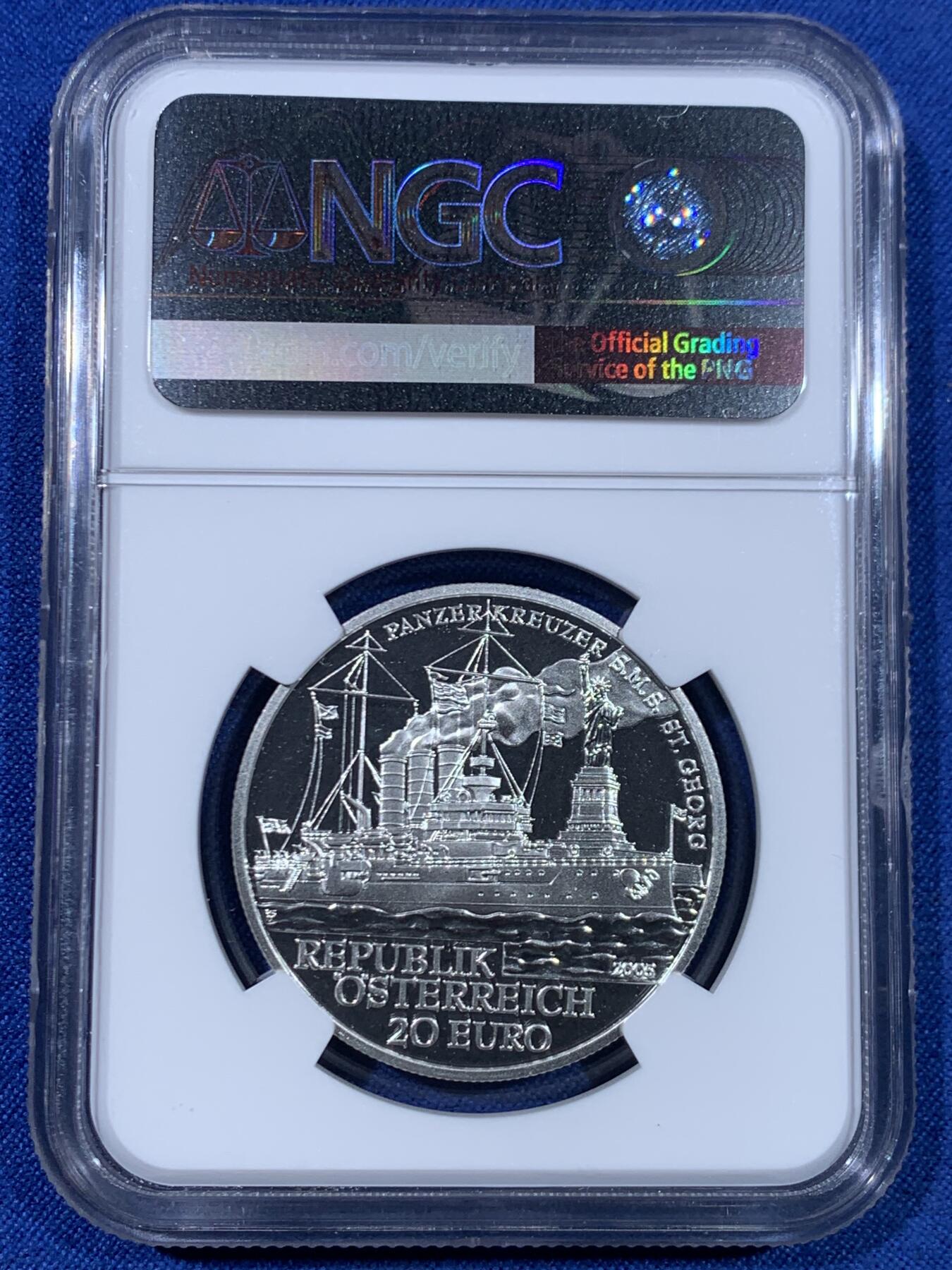 《竞宝斋》第445场 周日，周一，2场连拍 （全场包邮） 获奖币 NGC PF69UC 2005年奥地利圣乔治战舰20欧精制纪念银币（18克重，900银，盒证齐全，发行量5万枚）荣膺克劳斯世界硬币大赛2007年最佳银币，币面浮雕栩栩如生，波涛滚滚的海浪和远处若影若线的自由女神雕像见证了百年哈布斯堡王朝海军的昔日辉煌！（个人认为奥地利获奖币中美不胜收的一枚）