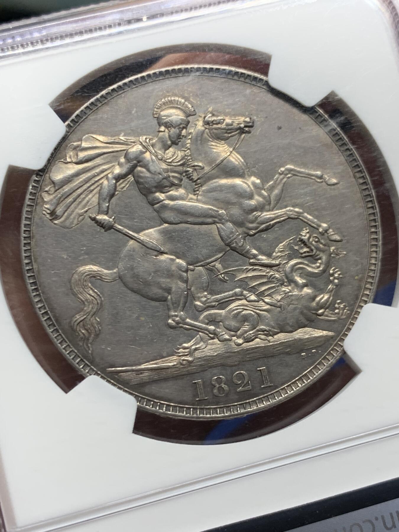 《竞宝斋》第445场 周日，周一，2场连拍 （全场包邮） NGC AU58 英国1821年乔治四世马剑克朗银币（底板光洁，包浆醇厚，少见的MS级表现）细节见图