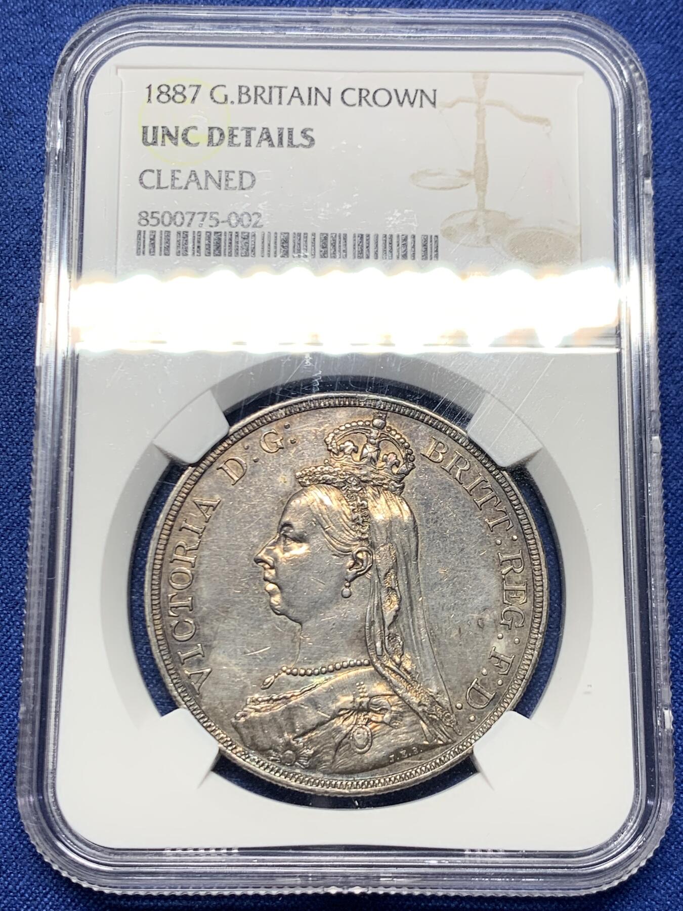 《竞宝斋》第445场 周日，周一，2场连拍 （全场包邮） NGC UNCD 1887年英国维多利亚高冠马剑1克朗大银币，双面靓丽包浆包浆，可惜没有分数，NGC评级清洗。