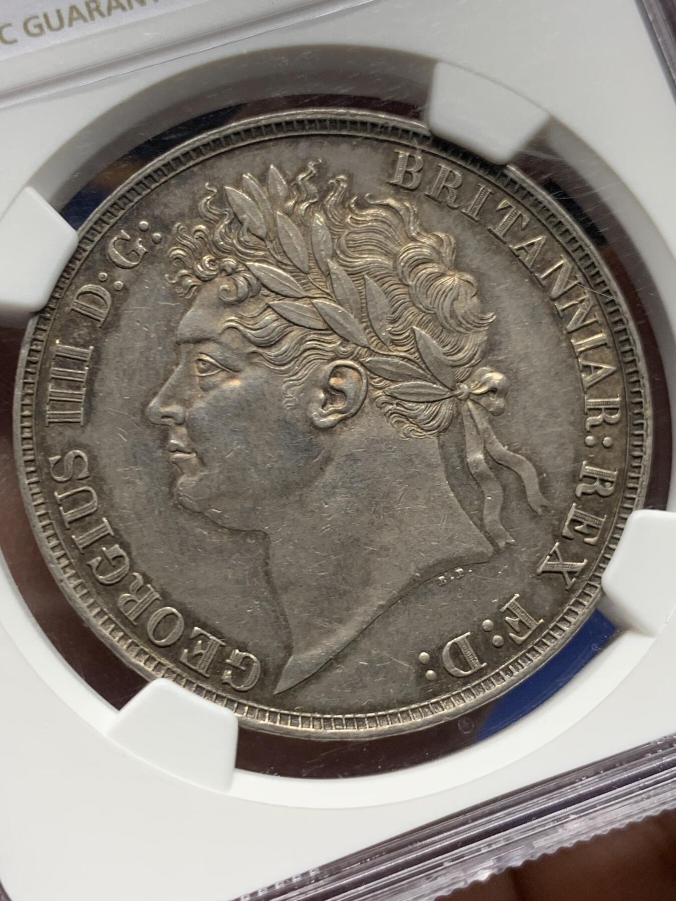 《竞宝斋》第445场 周日，周一，2场连拍 （全场包邮） NGC AU58 英国1821年乔治四世马剑克朗银币（底板光洁，包浆醇厚，少见的MS级表现）细节见图