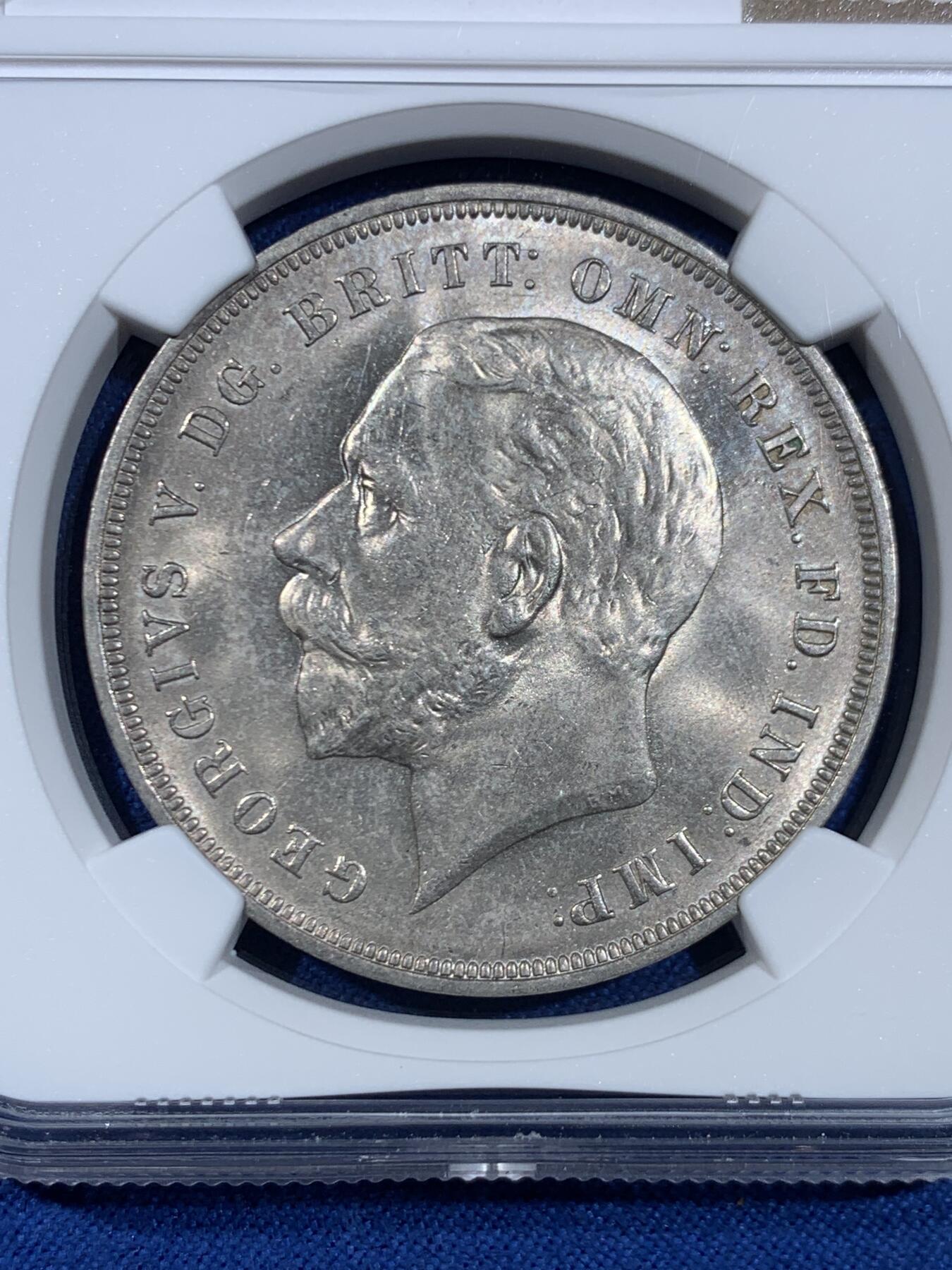 《竞宝斋》第445场 周日，周一，2场连拍 （全场包邮） NGC MS63 英国1935年乔治五世1克朗木马剑银币，光度不错，状态也好。