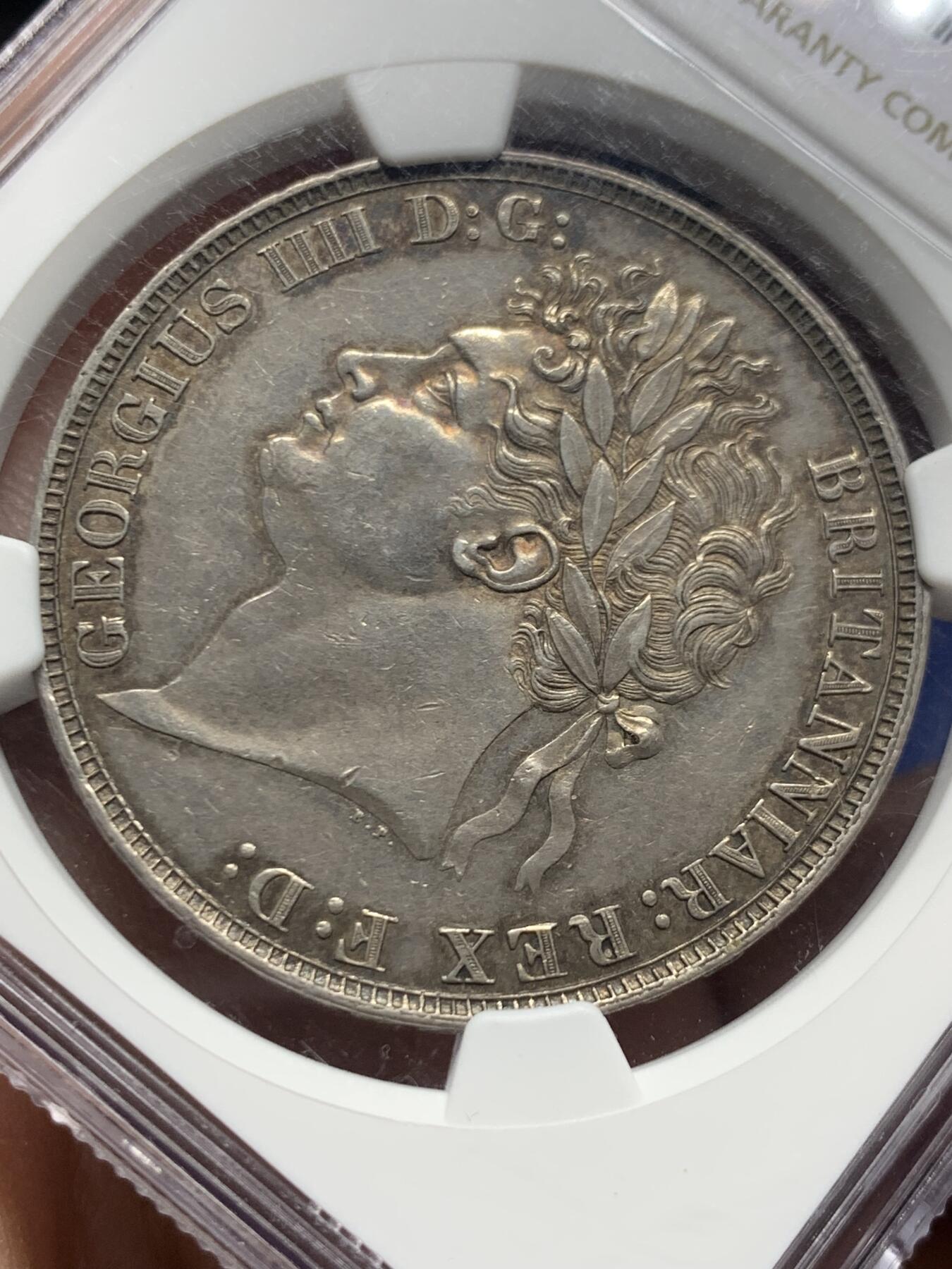 《竞宝斋》第445场 周日，周一，2场连拍 （全场包邮） NGC AU58 英国1821年乔治四世马剑克朗银币（底板光洁，包浆醇厚，少见的MS级表现）细节见图