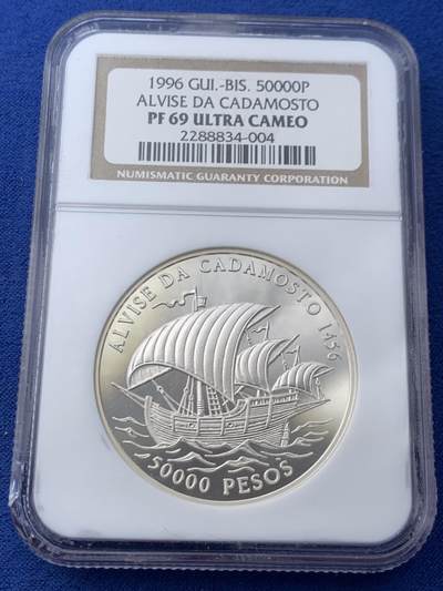 《竞宝斋》第445场 周日，周一，2场连拍 （全场包邮） - NGC PF69UC 几内亚比绍1996年Alvise da Cadamosto诞辰540周年-航海50000P银币 925银 31.47克 盒子左下角有磕