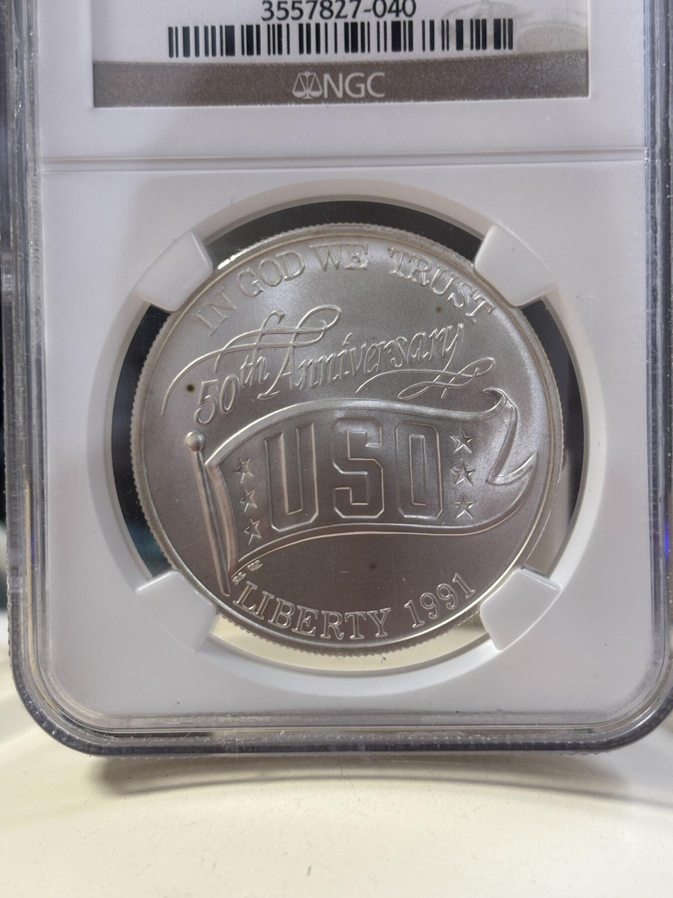 第185期拍卖 美国1991年USO(劳军组织)成立50年银币NGC-MS69，900银，26.72克