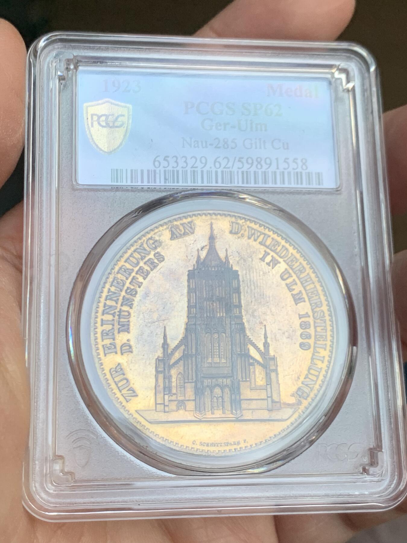 《竞宝斋》第445场 周日，周一，2场连拍 （全场包邮） PCGS MS62 德国1923年乌尔姆教堂修复纪念镀金铜章 镀金层保留的很不错 一面和教堂泰勒同款 PL底板 状态非常好