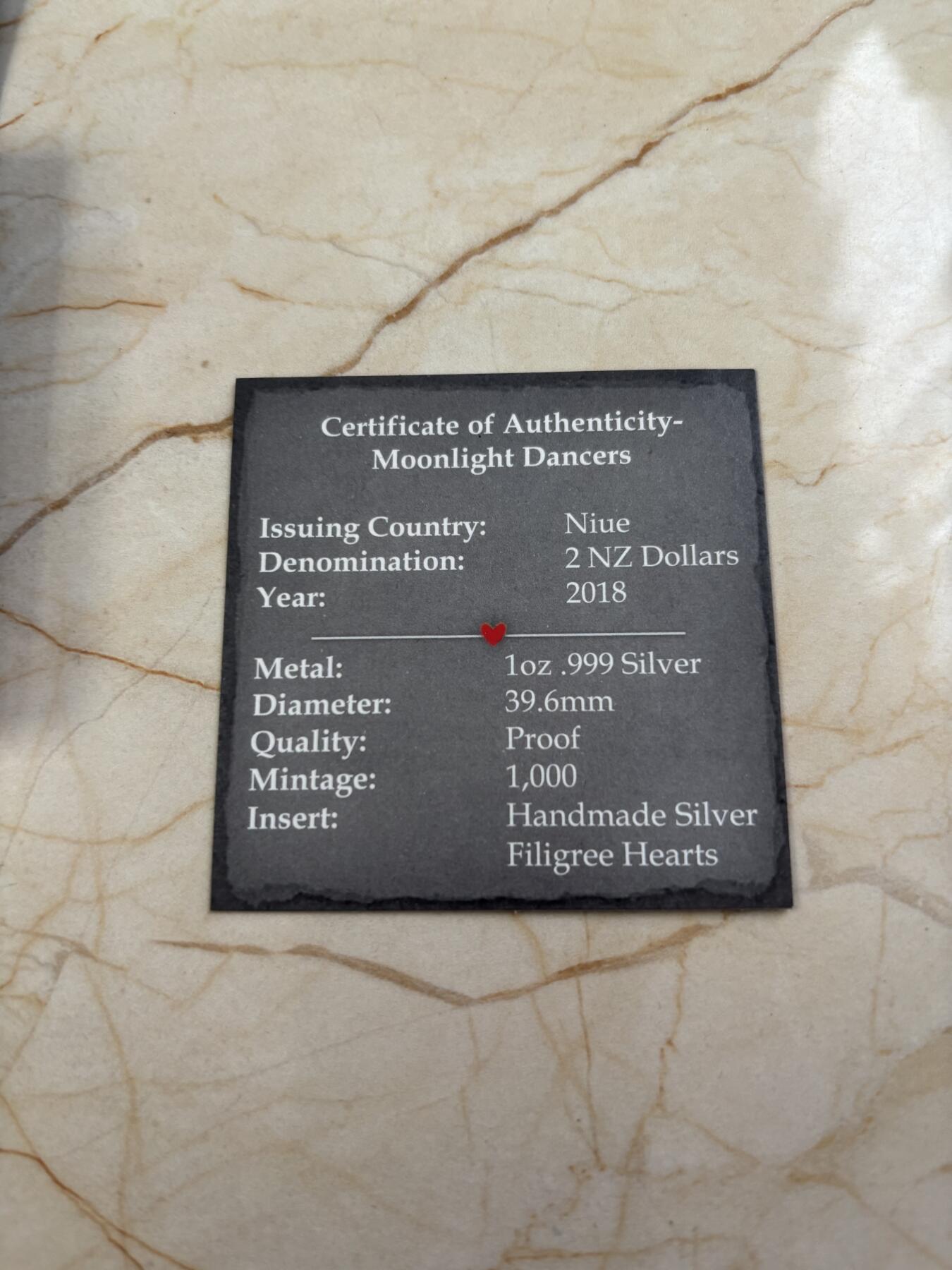 第185期拍卖 纽埃2018年爱情系列月光舞者1盎司彩色纪念银币，999银，发行1000枚