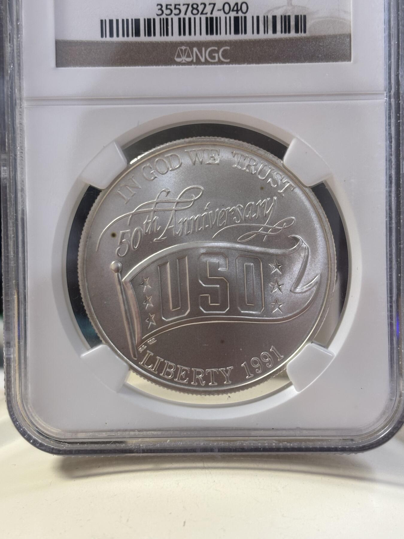 第185期拍卖 美国1991年USO(劳军组织)成立50年银币NGC-MS69，900银，26.72克