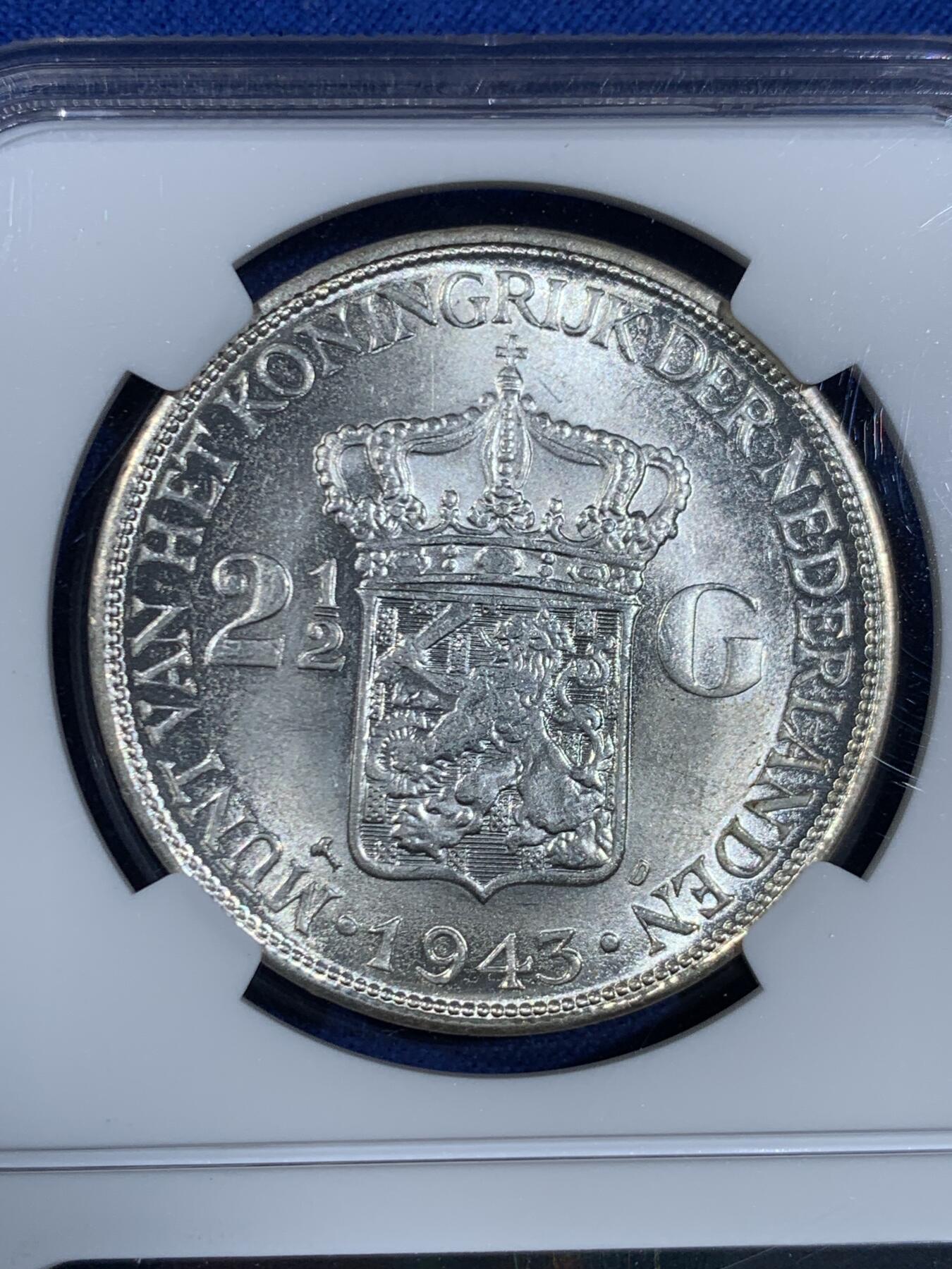 《竞宝斋》第445场 周日，周一，2场连拍 （全场包邮） NGC MS64 荷属东印度1943年2.5盾大银币