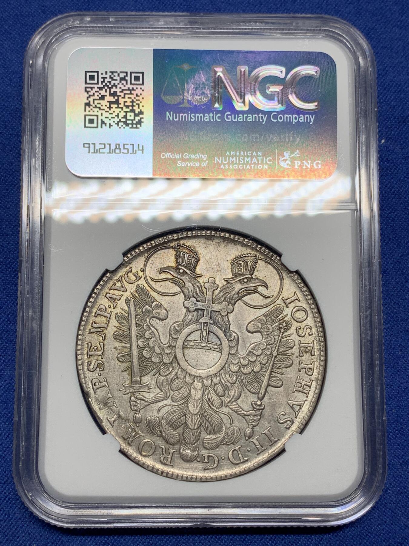 《竞宝斋》第445场 周日，周一，2场连拍 （全场包邮） NGC AUD 纽伦堡 1768年1泰勒银币 神罗纽伦堡城市景观大泰勒 错杀 该系列品种必备 城景细节较好 背面鹰徽羽毛纹理清晰 正面4点钟方向为铸缺 少见品种