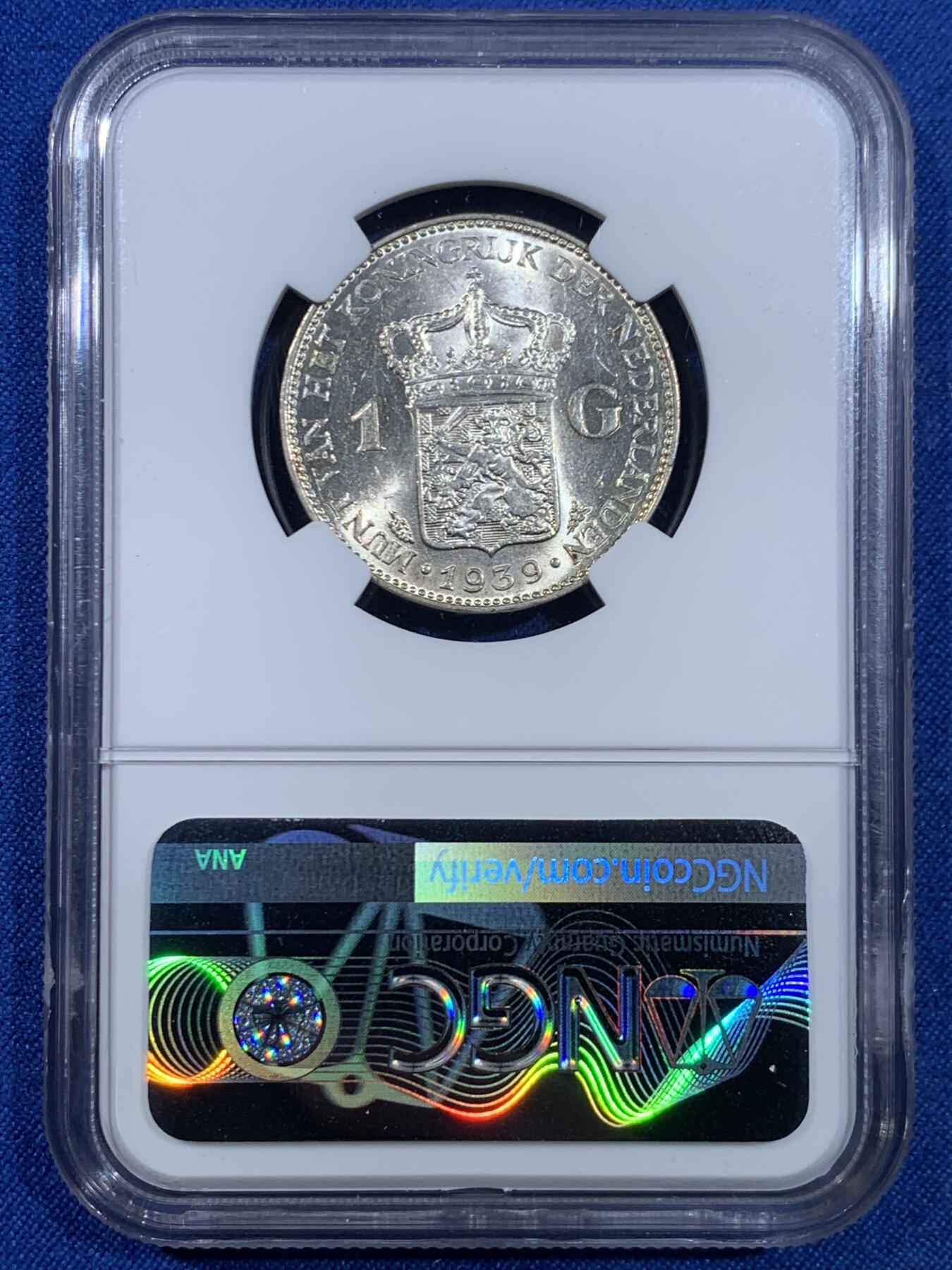 《竞宝斋》第445场 周日，周一，2场连拍 （全场包邮） NGC MS61 荷兰1939年威廉敏娜女王1盾银币，少见品种，十字转光，打制清晰。