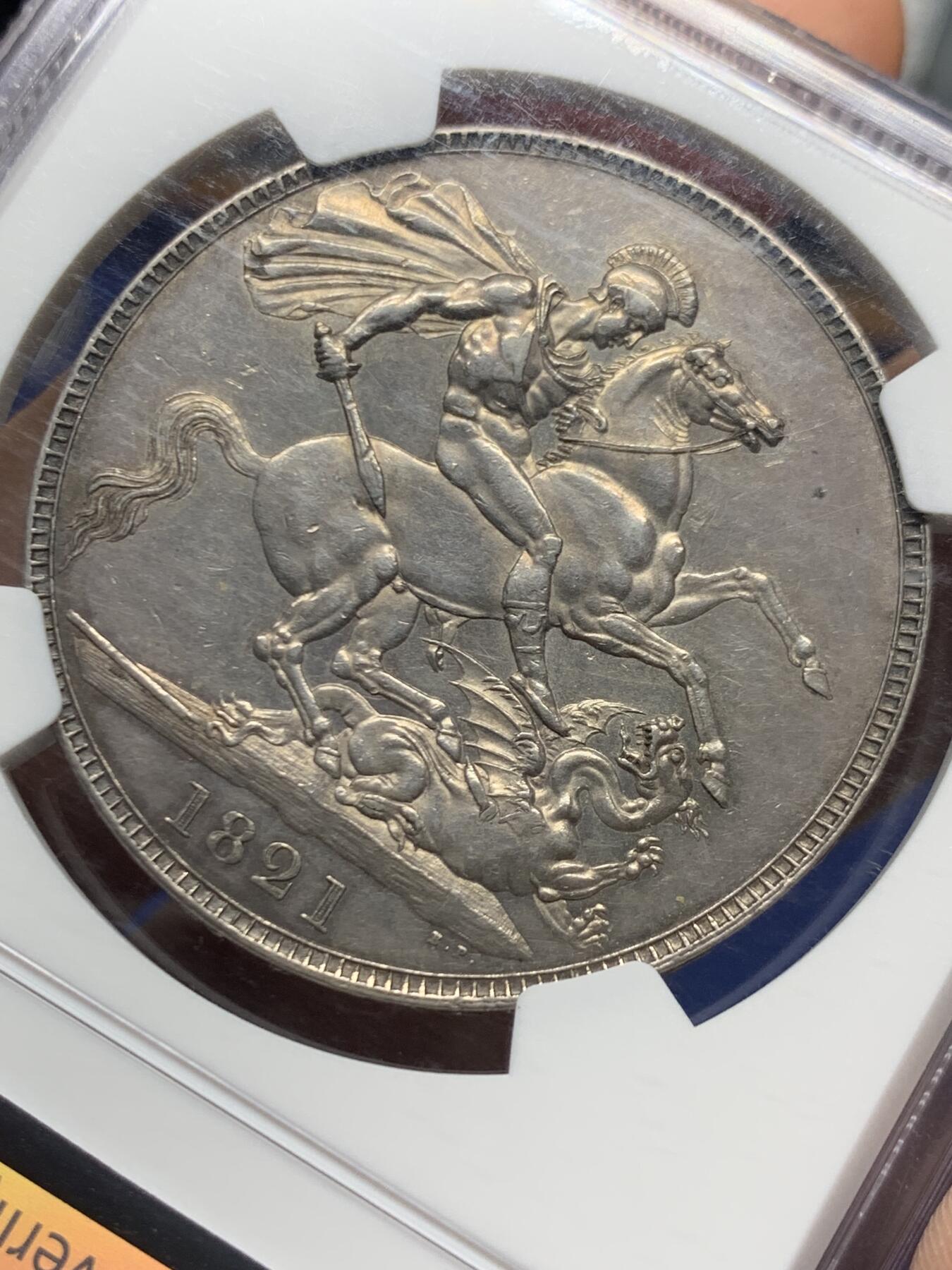 《竞宝斋》第445场 周日，周一，2场连拍 （全场包邮） NGC AU58 英国1821年乔治四世马剑克朗银币（底板光洁，包浆醇厚，少见的MS级表现）细节见图