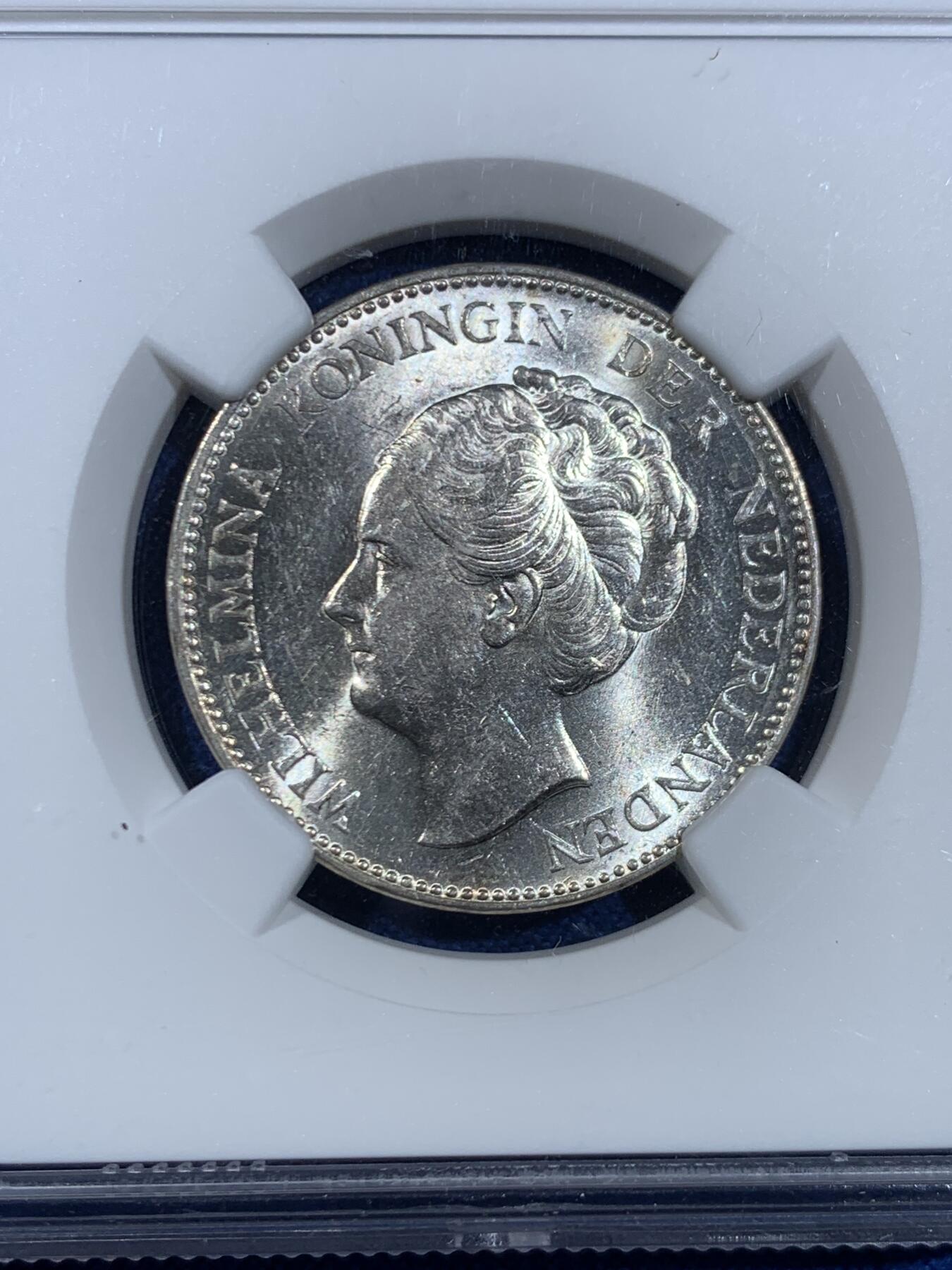 《竞宝斋》第445场 周日，周一，2场连拍 （全场包邮） NGC MS61 荷兰1939年威廉敏娜女王1盾银币，少见品种，十字转光，打制清晰。