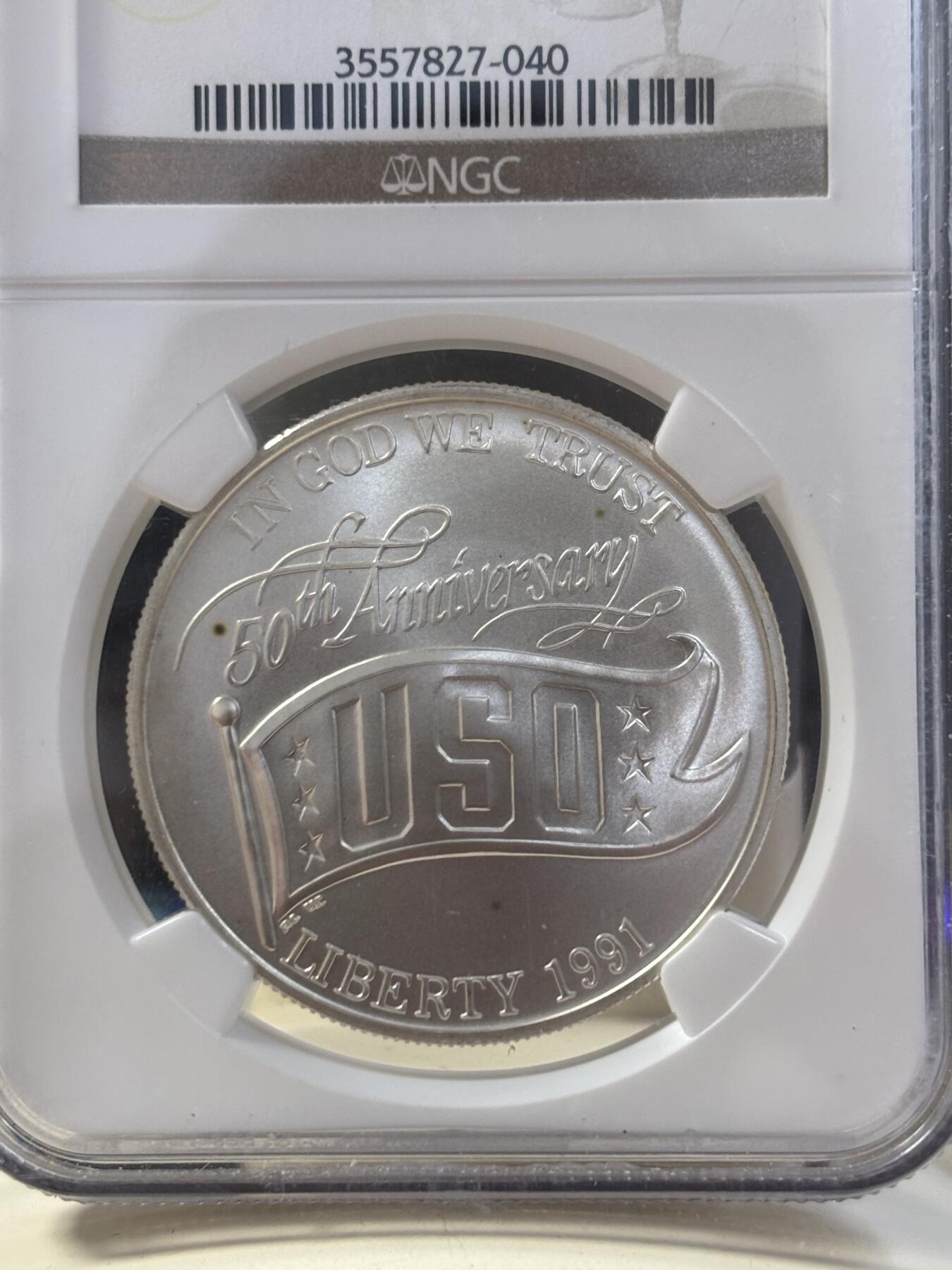 第185期拍卖 美国1991年USO(劳军组织)成立50年银币NGC-MS69，900银，26.72克
