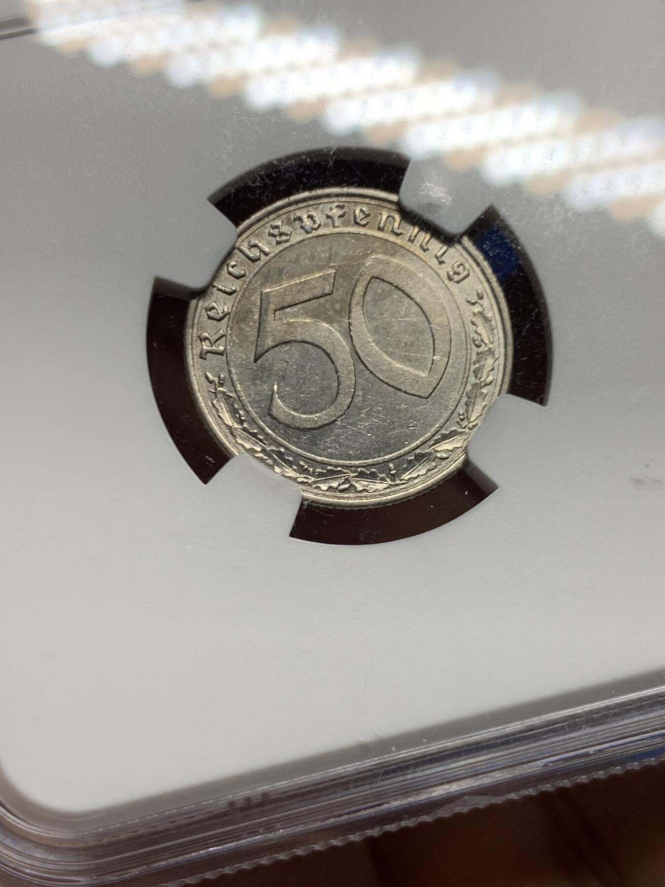 《竞宝斋》第446场 周日，周一，2场连拍 （全场包邮） NGC UNCD 德国1938年帝国50芬妮镍币，传说重大回炉坦克币，带风车标。