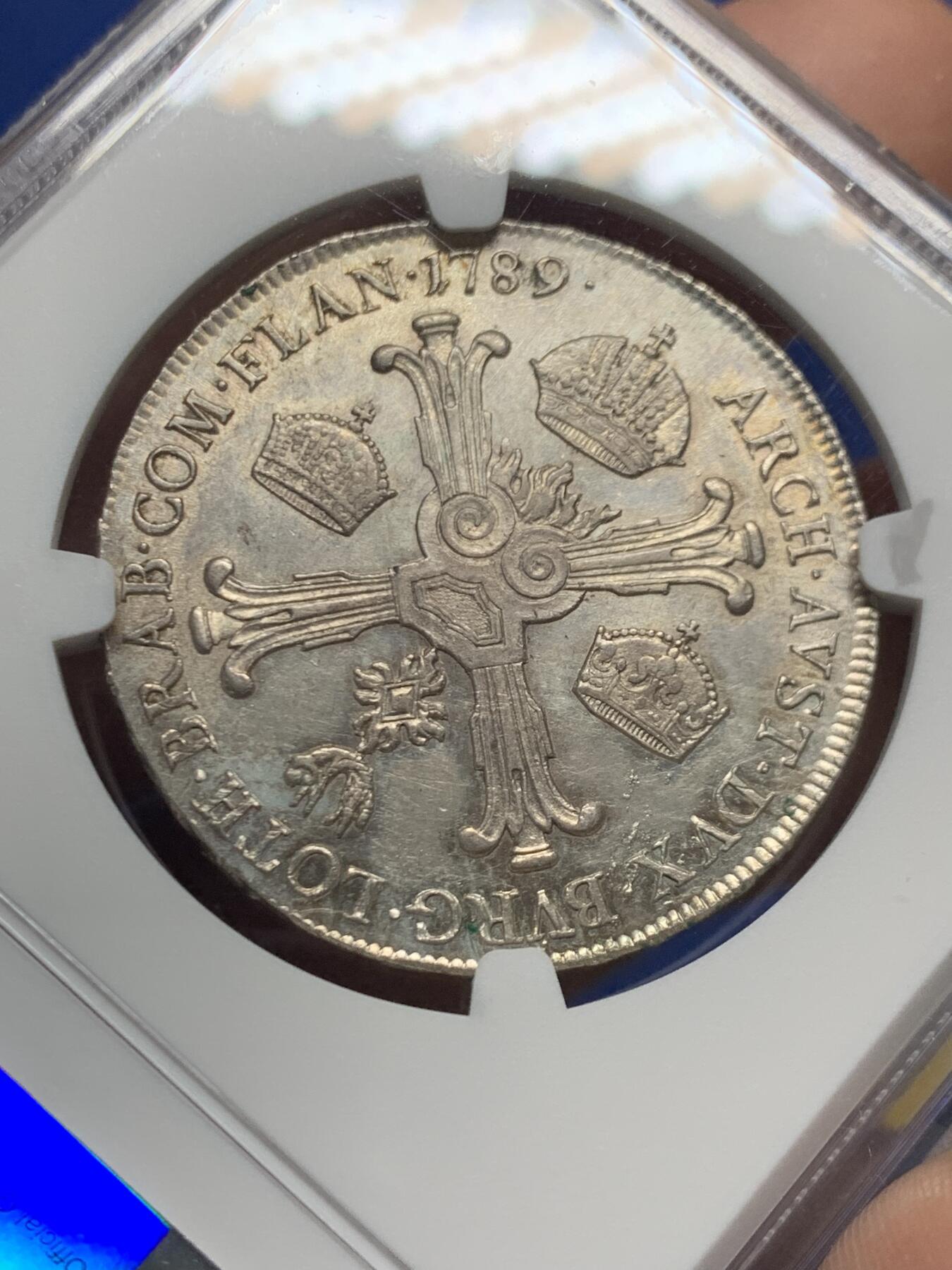 《竞宝斋》第446场 周日，周一，2场连拍 （全场包邮） 唯一冠军分 NGC MS62 奥属尼德兰 1789年 约瑟夫二世 1/2泰勒银币 全深打在这个品类上已经很难得了 包浆也好