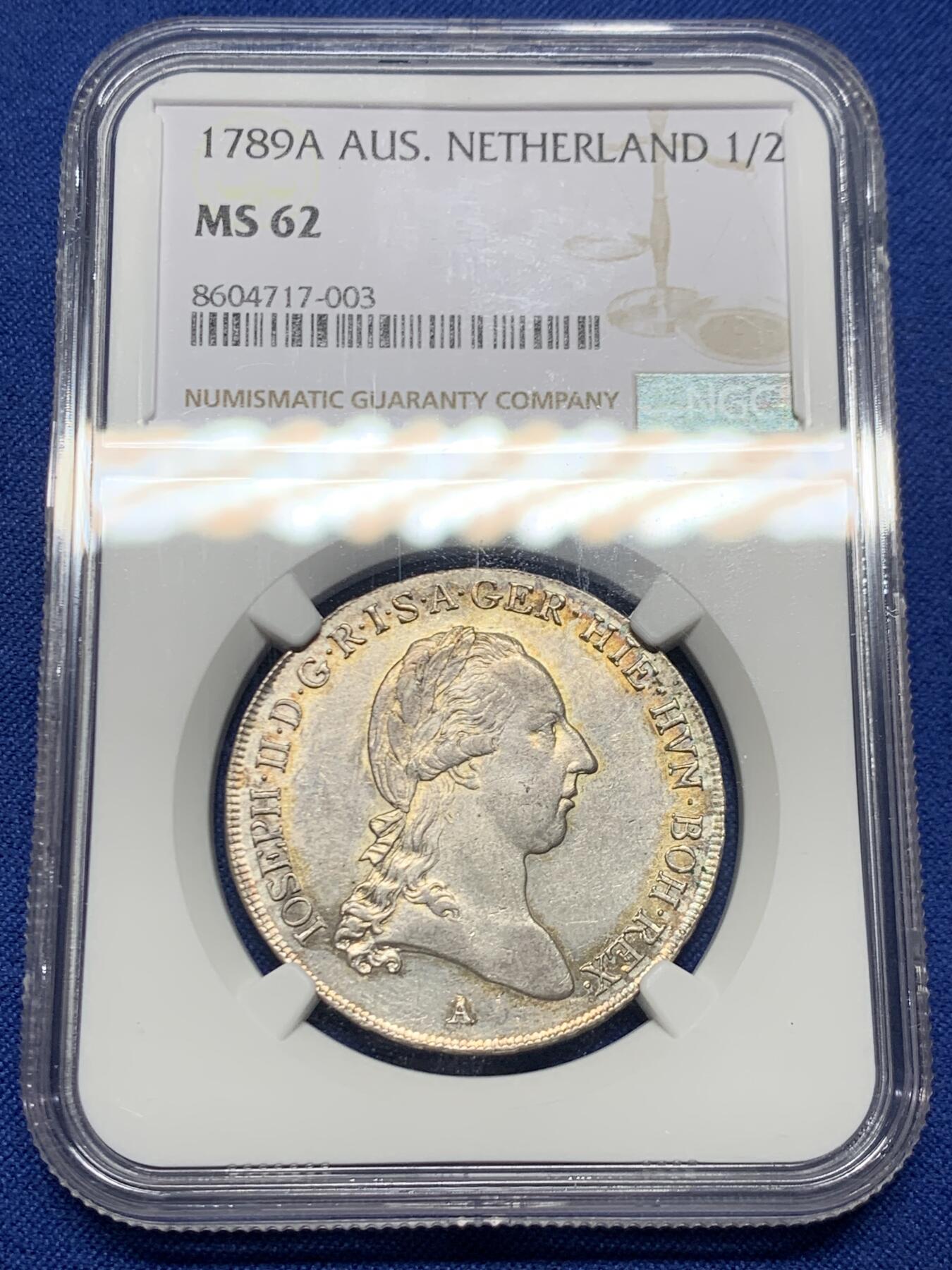 《竞宝斋》第446场 周日，周一，2场连拍 （全场包邮） 唯一冠军分 NGC MS62 奥属尼德兰 1789年 约瑟夫二世 1/2泰勒银币 全深打在这个品类上已经很难得了 包浆也好