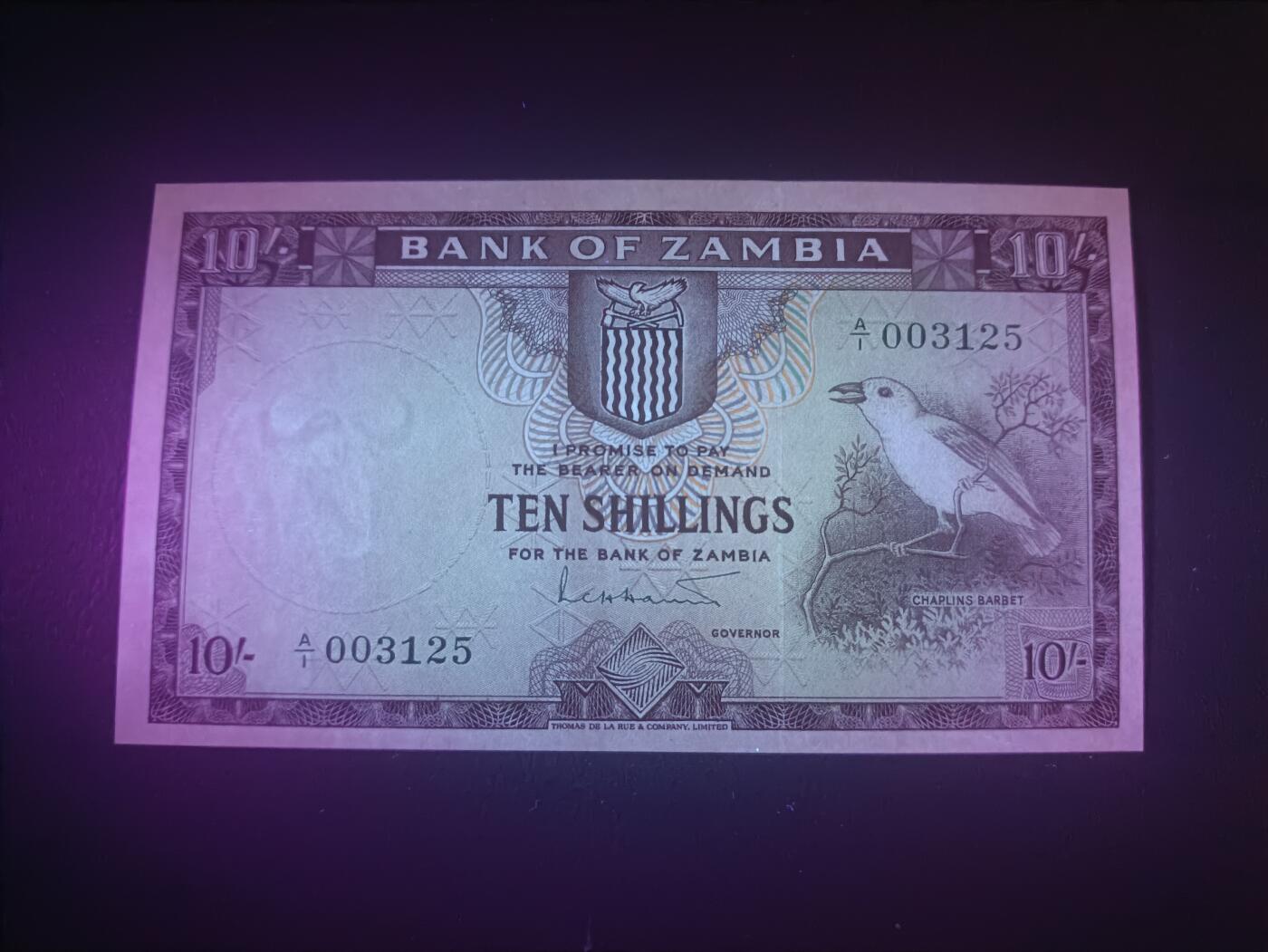 2025十二月第二期，总207期 赞比亚1964版10先令AUNC首冠A/1千位号3125无47，查氏拟啄木鸟和农耕，稀有的独立后首版