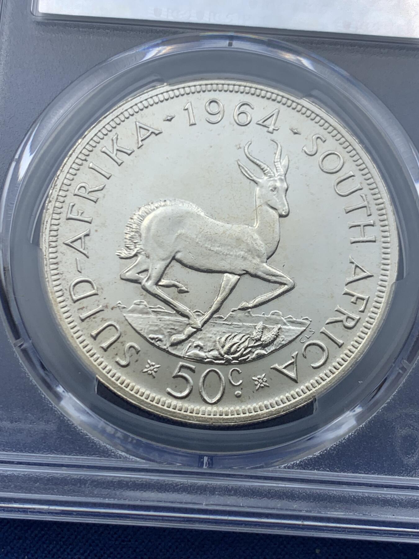 《竞宝斋》第446场 周日，周一，2场连拍 （全场包邮） PCGS PL66 南非1964年吕贝克跳羚羊50分银币，PL类精制，币面清爽干净又舒适，状态一流。