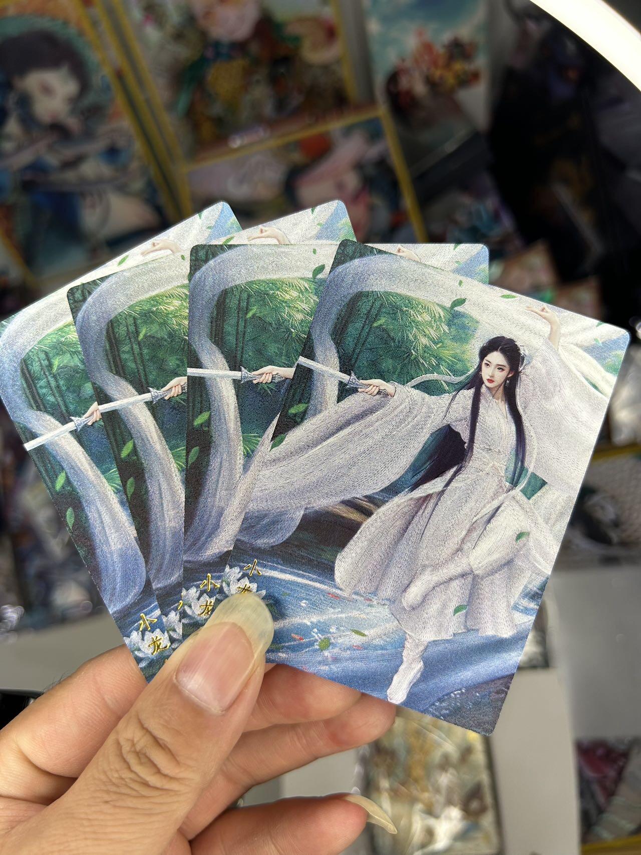 喜灰玩卡首拍第一期免佣金 桔梗神凰百剑行小龙女三渐变加人体艺术卡共四张