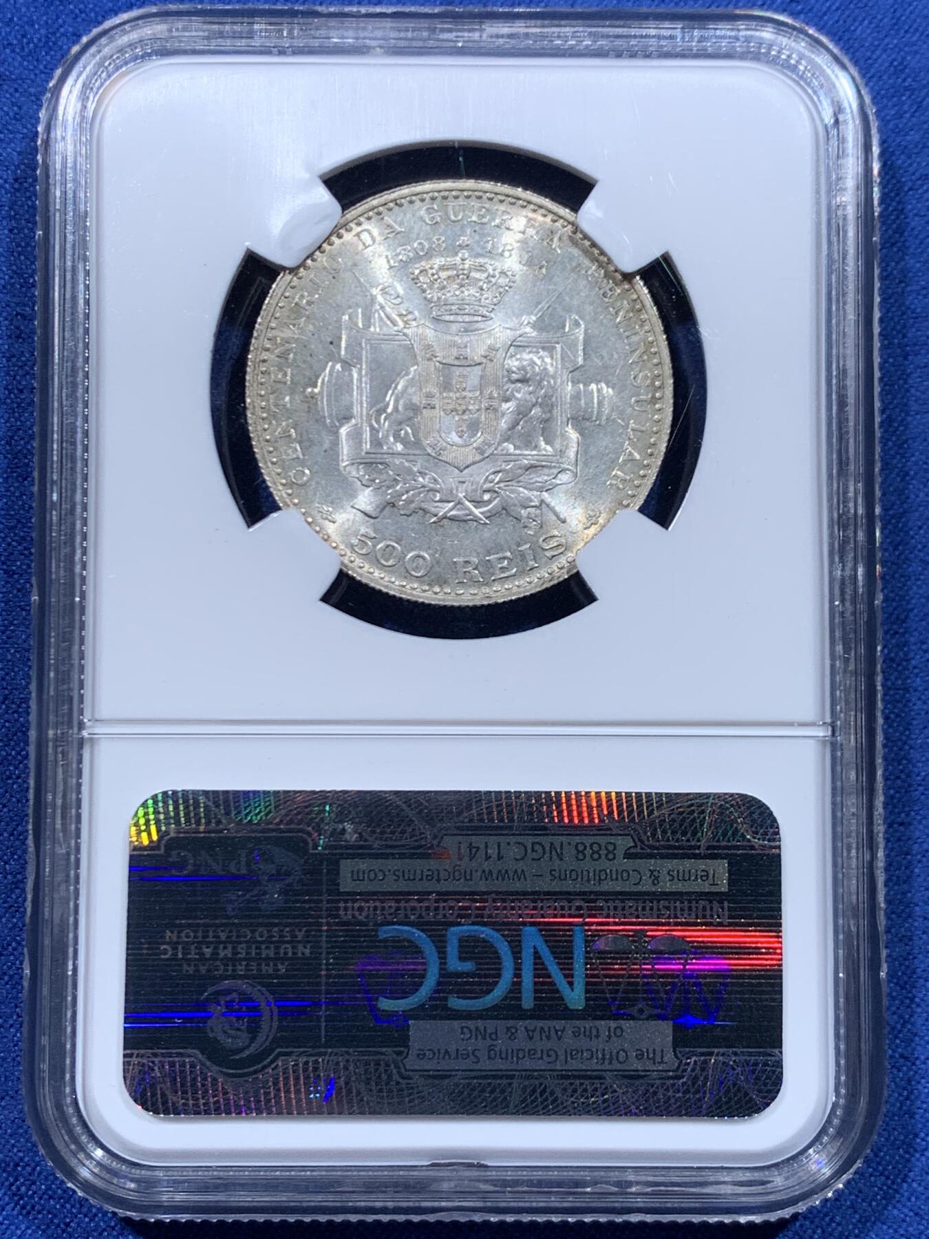 《竞宝斋》第446场 周日，周一，2场连拍 （全场包邮） NGC MS63 葡萄牙1910年半岛战争500R银币，稀少品种，末代小王子头像。淡金环彩，银光粉润，状态非常好。老N盒品质保障