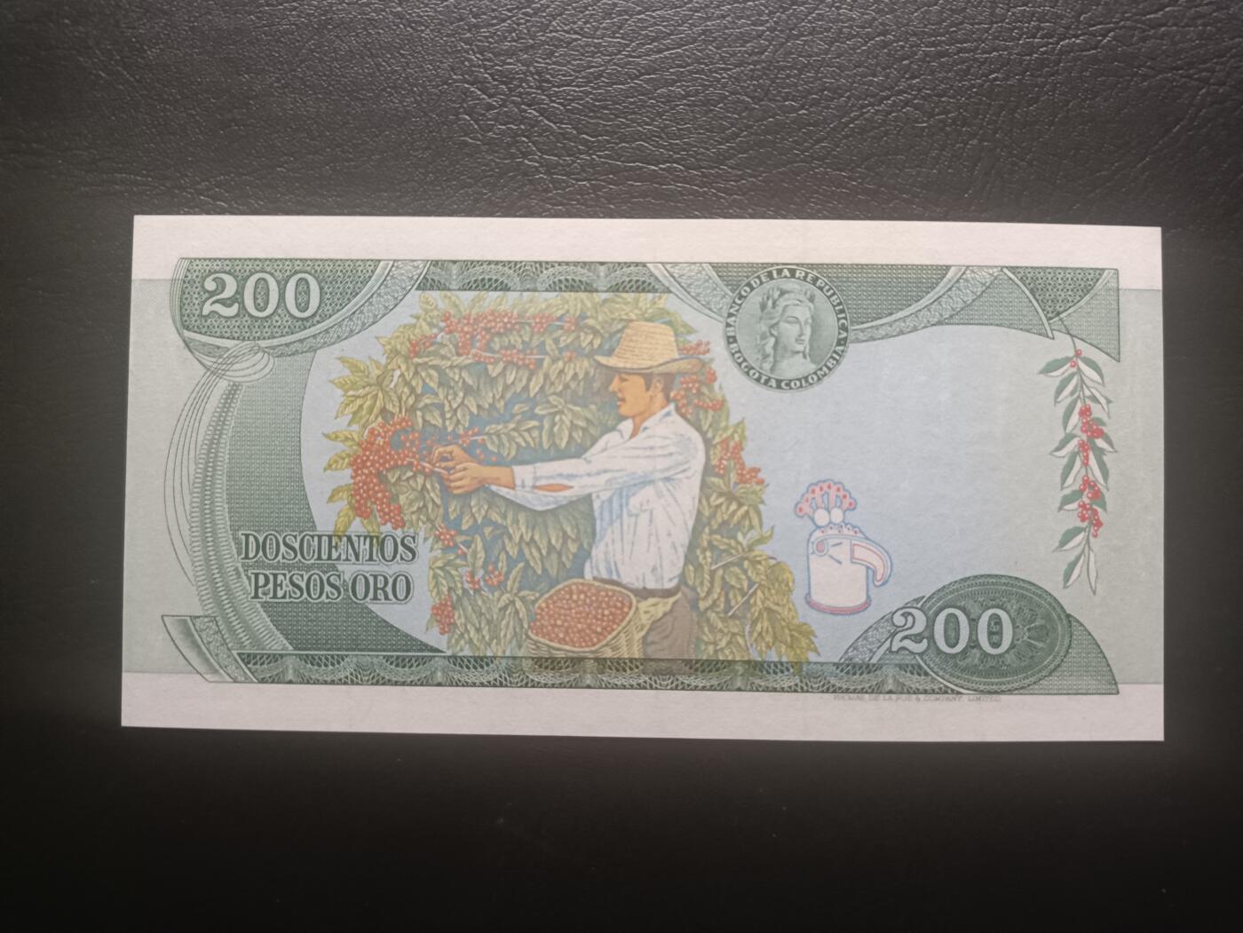 2025十二月第二期，总207期 哥伦比亚1978年200比索AUNC长号无4，玻利瓦尔将军和咖啡豆采摘