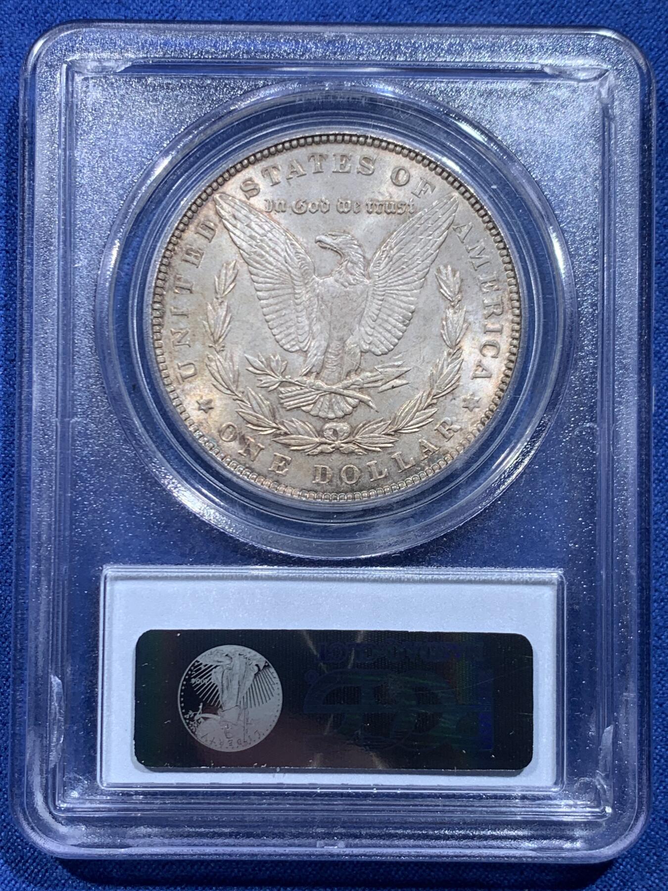 《竞宝斋》第446场 周日，周一，2场连拍 （全场包邮） PCGS MS63 美国1889年摩根银币，老白盒严评，状态很好，带点环彩。背面支撑四角有磕