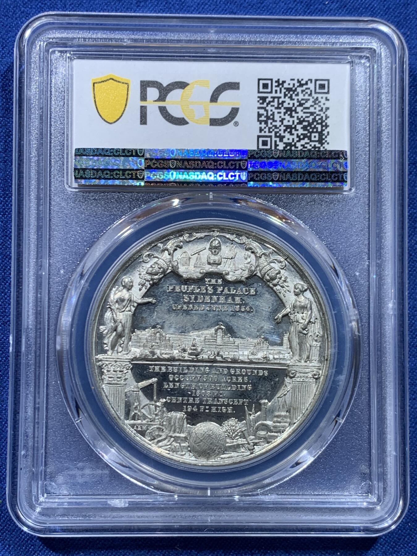 《竞宝斋》第446场 周日，周一，2场连拍 （全场包邮） 唯一冠军分，PCGS SP63 英国1854年水晶宫开放纪念章，WM材质保存不易历经170年能有如此品相堪称奇迹，双面高浮雕工艺精雕细琢，细节丰富到令人惊叹