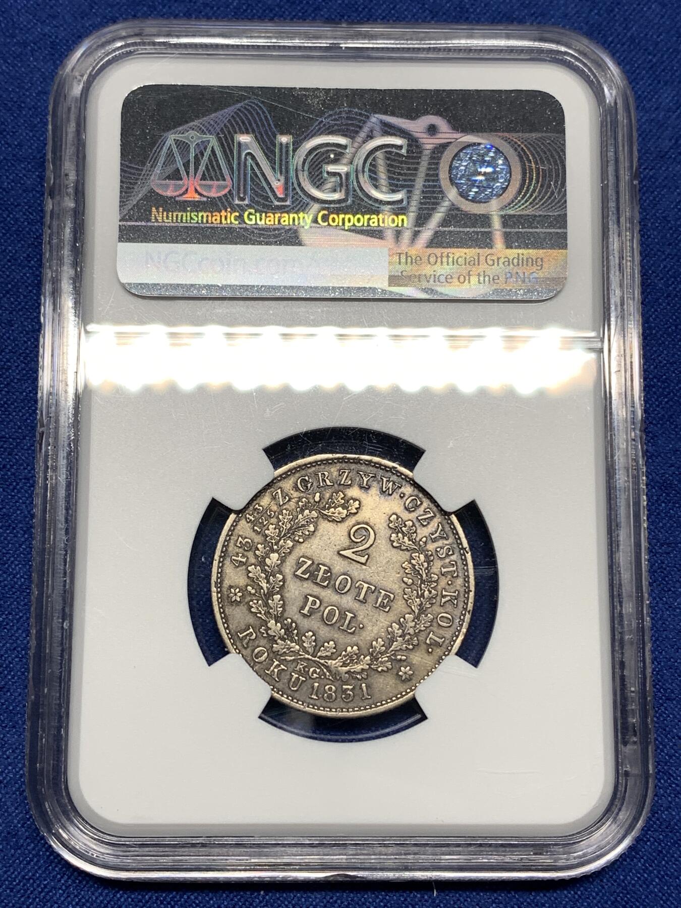 《竞宝斋》第446场 周日，周一，2场连拍 （全场包邮） NGC XFD 波兰革命政府 1831年 2兹罗提 银币 波兰在1830年起义（十一月起义）后曾短暂建立民族政府 直到1831年9月被沙俄镇压 该时期发行的钱币极为少见 克书参考价375美金（XF-40） 稀缺品种