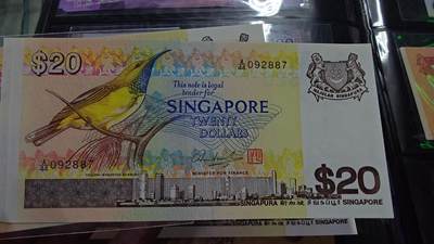 世界钱币～微拍第219期暨2025年第59期  老库存低价起拍 - 1979年新加坡鸟版20元 全新绝品无4尾号887