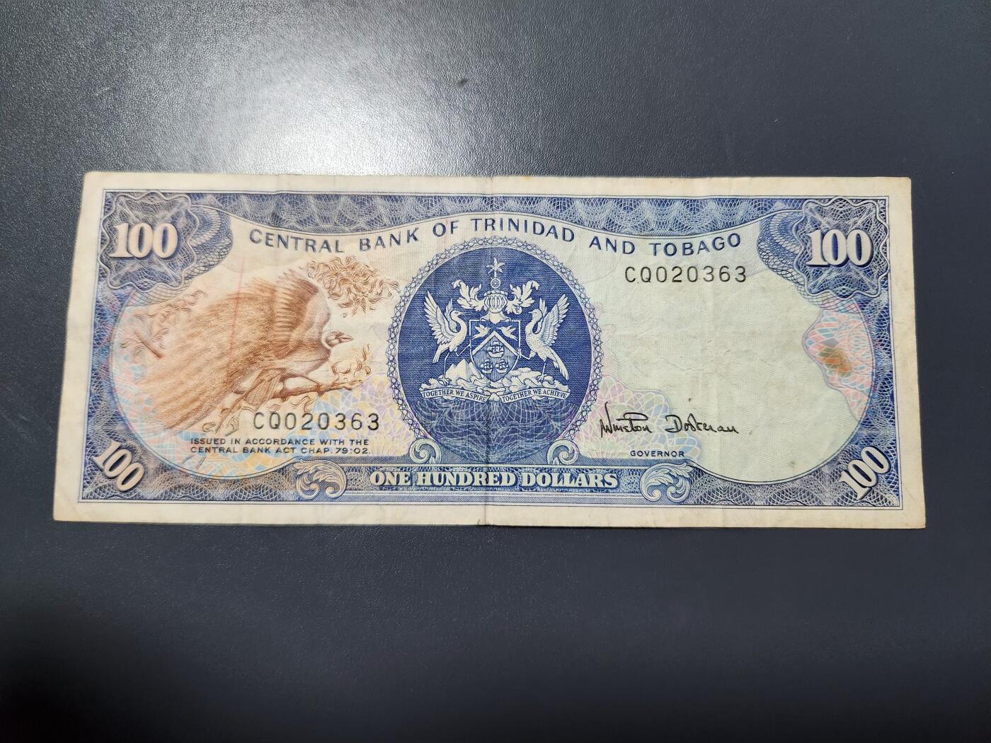 12月10号晚上8点 外国纸币自动截拍第71场 特立尼达和多巴哥100元 1979年 极美品 稀少签名