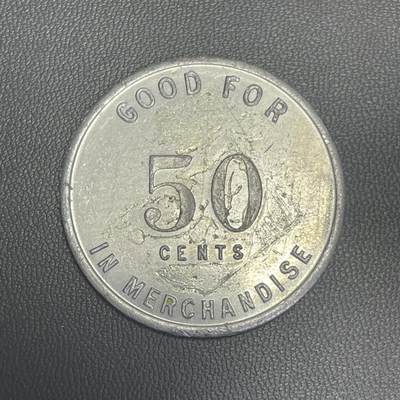 回流1208 - 美国“巴黎图书休息室”发行的店内商品代用币 这类“商店代币”是20世纪中期美国小型商户的常见营销工具，尤其在书店、咖啡馆等场所流行，既可以替代小额现金用于店内消费，也能作为“收藏型赠品”吸引顾客，是“本地商业文化”的实物载体。