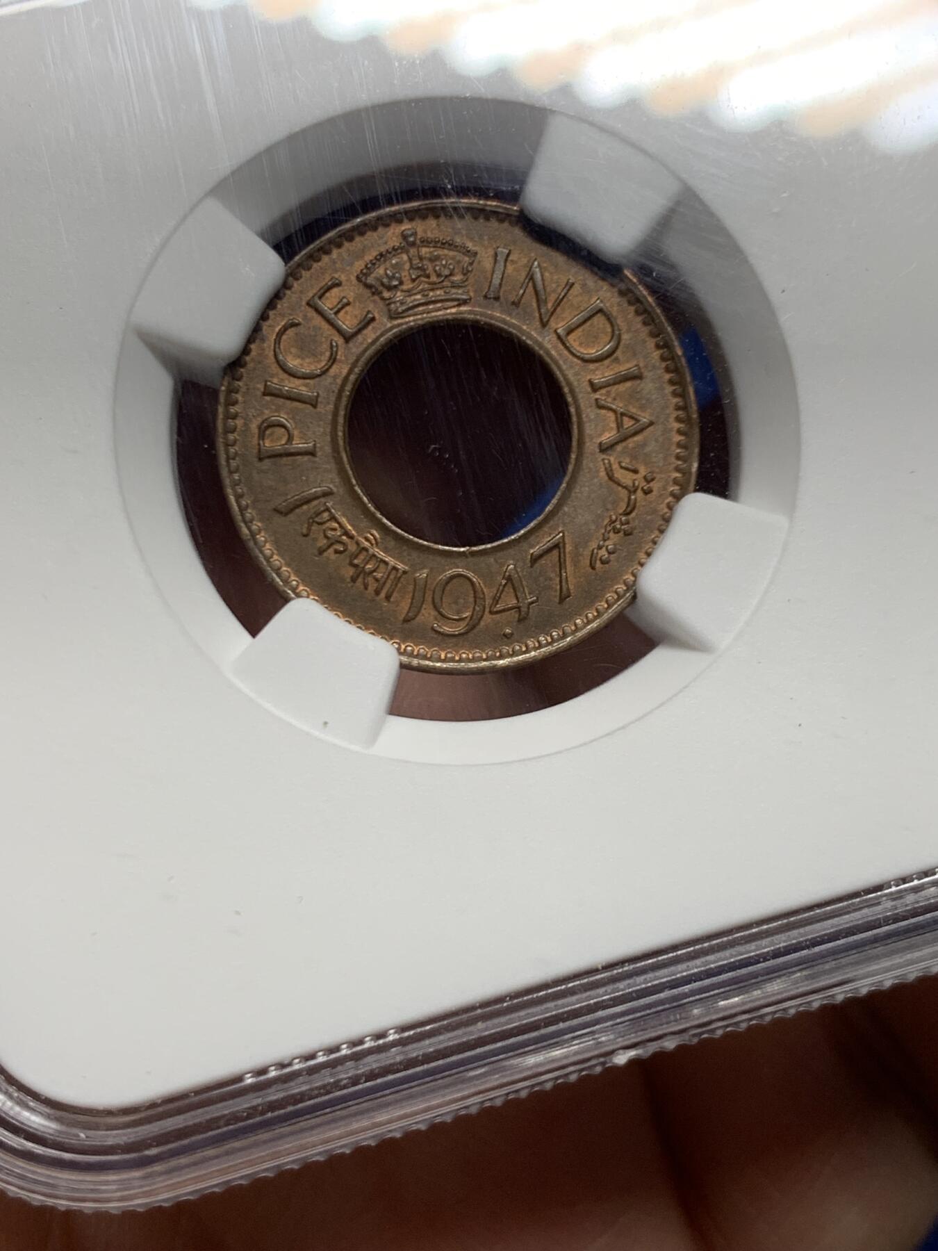 《竞宝斋》第446场 周日，周一，2场连拍 （全场包邮） NGC MS64BN 印度1947年1派沙中孔小铜币，是英属印度的关门年份币，少见年份，当年印度即独立了，很有纪念意义的一枚，分数合格