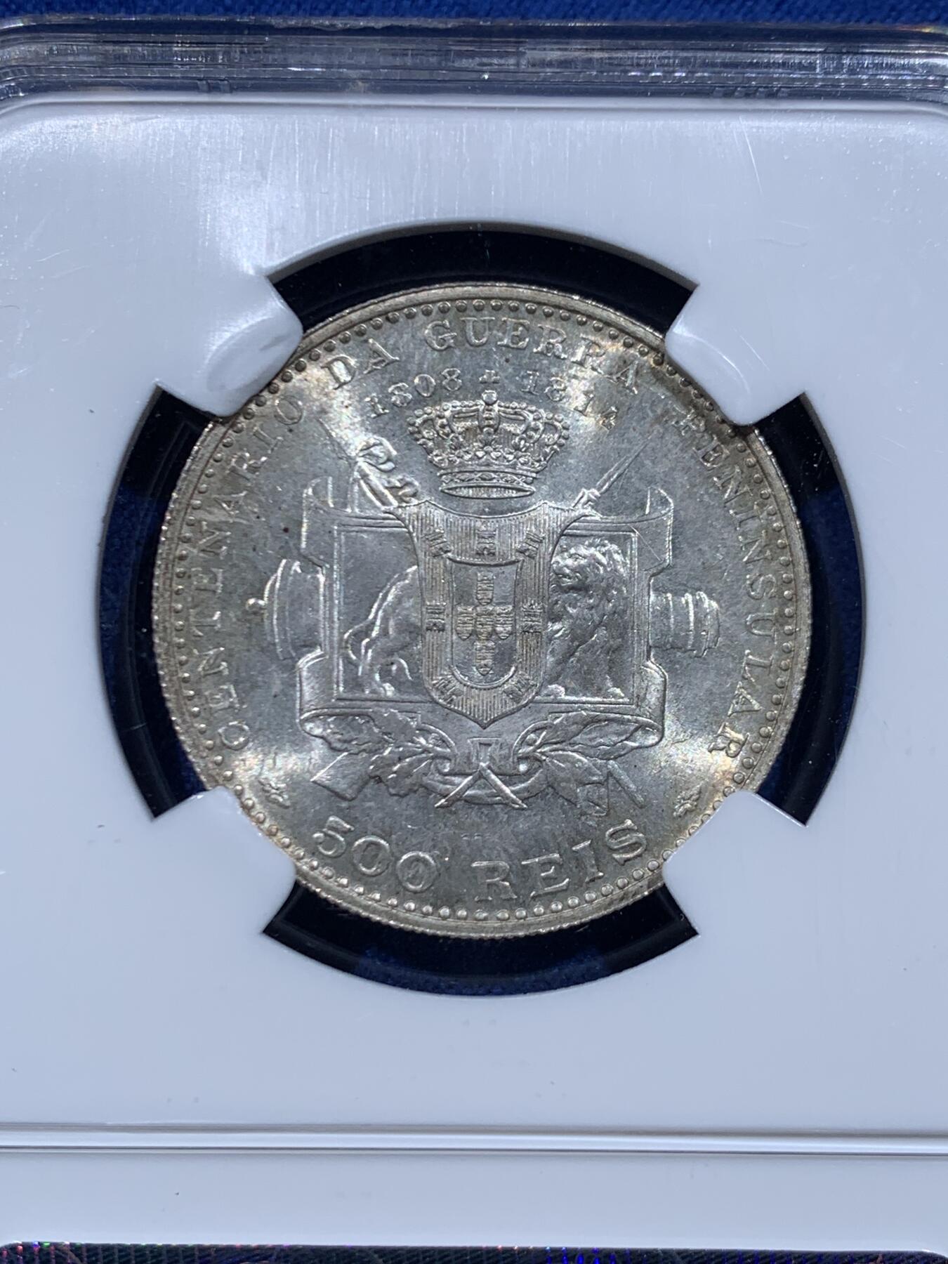 《竞宝斋》第446场 周日，周一，2场连拍 （全场包邮） NGC MS63 葡萄牙1910年半岛战争500R银币，稀少品种，末代小王子头像。淡金环彩，银光粉润，状态非常好。老N盒品质保障