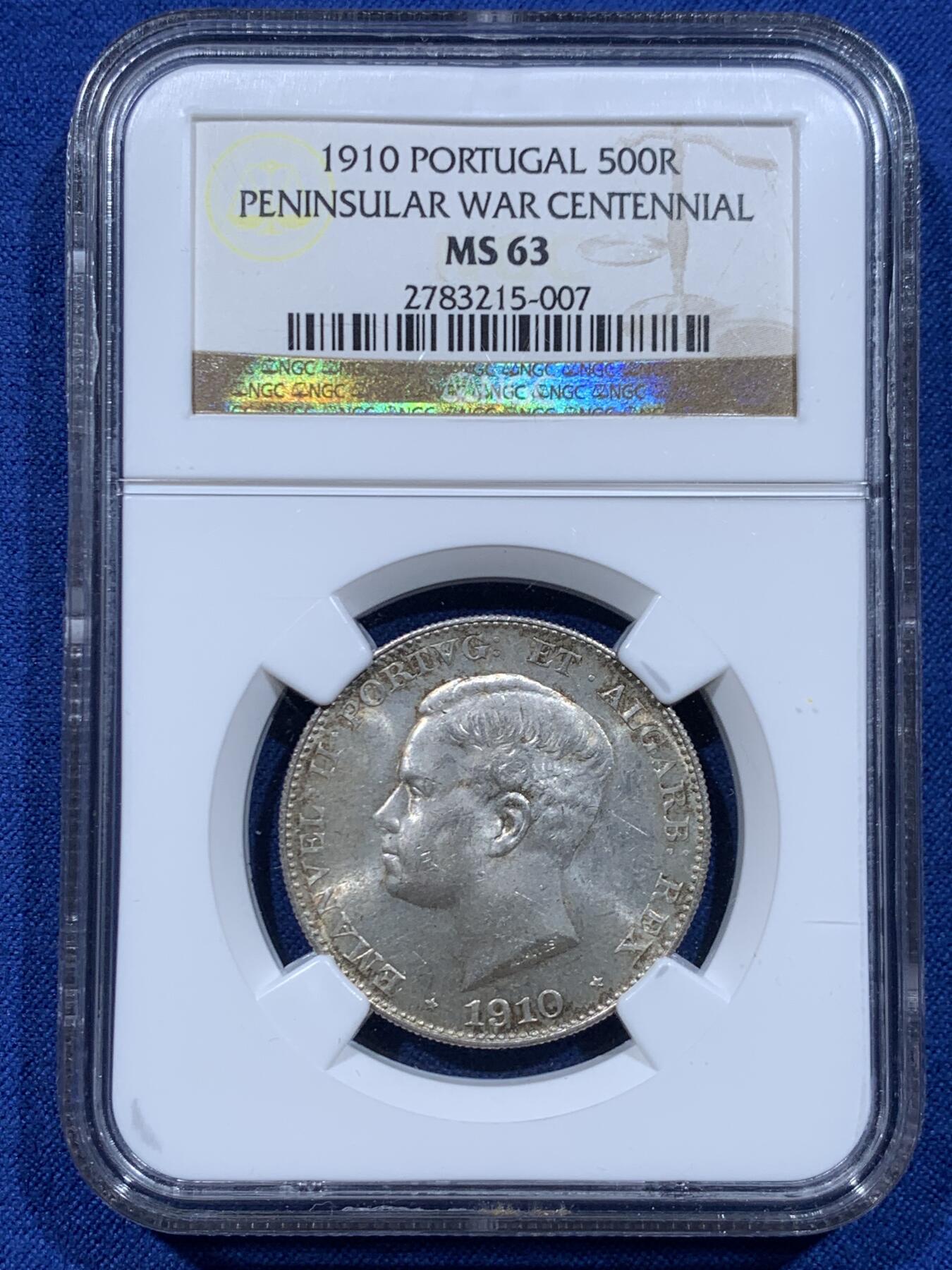 《竞宝斋》第446场 周日，周一，2场连拍 （全场包邮） NGC MS63 葡萄牙1910年半岛战争500R银币，稀少品种，末代小王子头像。淡金环彩，银光粉润，状态非常好。老N盒品质保障
